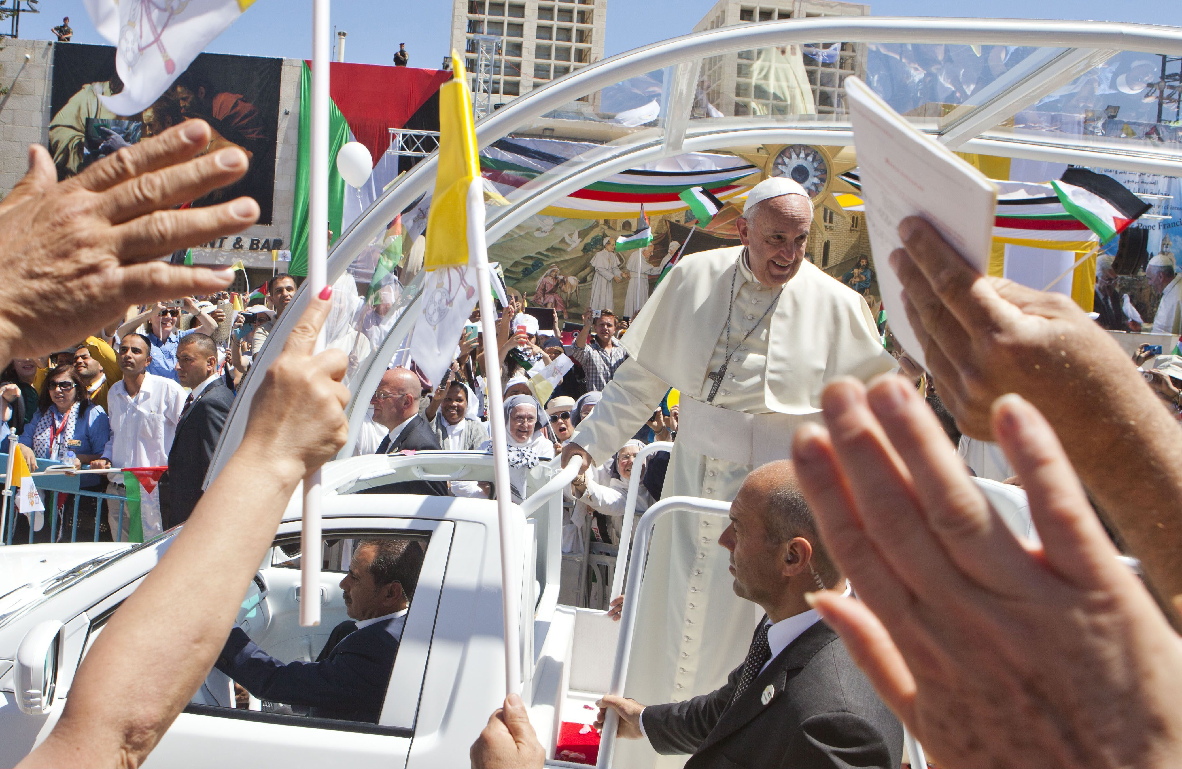 Pope Francis arrived in Bethlehem's Manger Square in an open vehicle where over 10,000 Christian pilgrims were packed on May 25, 2014 in the West Bank. (Heidi Levine—SIPA)