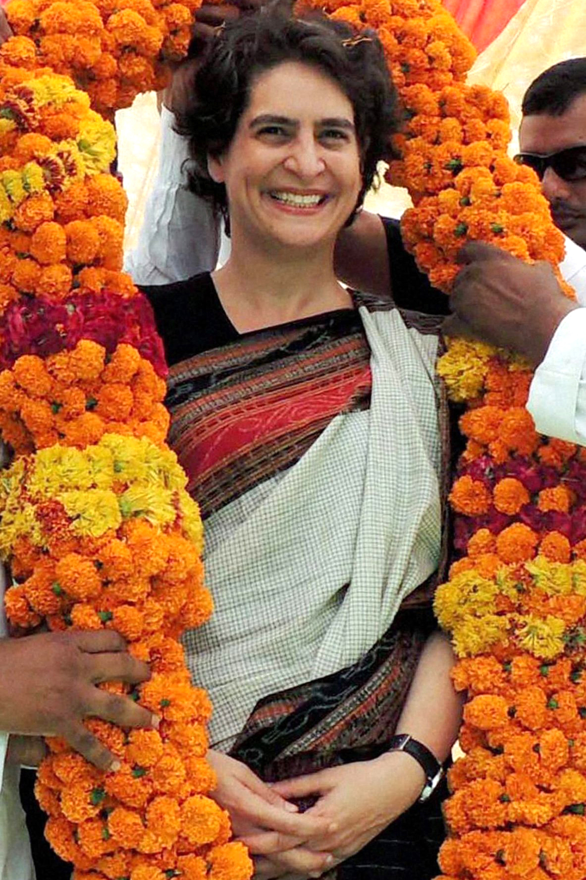 Priyanka Vadra, daughter of Congress party president Sonia Gandhi, receives a giant garland during an election campaign in her motherís constituency of Rae Bareli, India, on April 22, 2014.