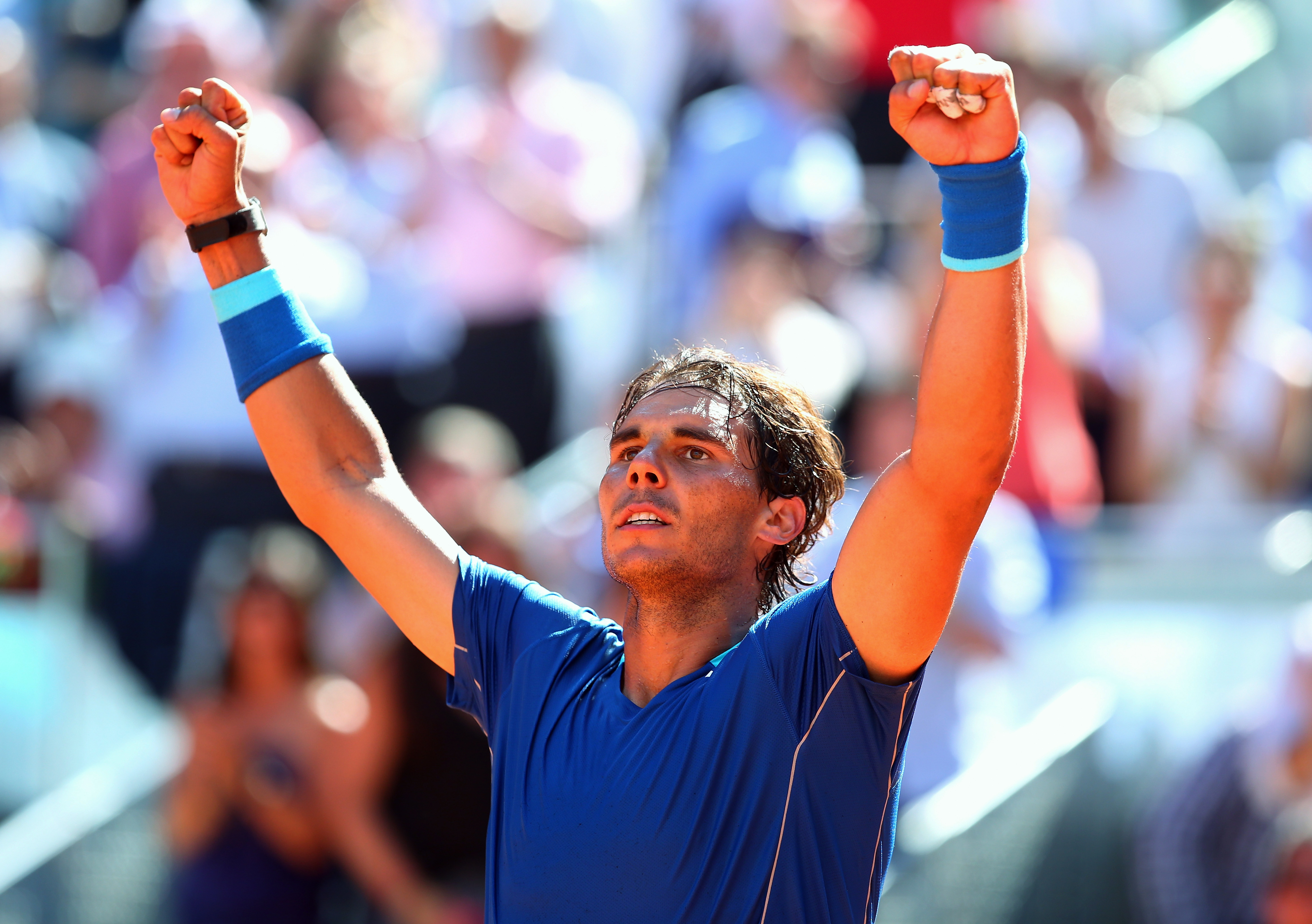 Rafael Nadal of Spain celebrates defeating Tomas Berdych of Czech Republic during day seven of the Mutua Madrid Open tennis tournament at the Caja Magica on May 9, 2014 in Madrid. (Julian Finney—Getty Images)
