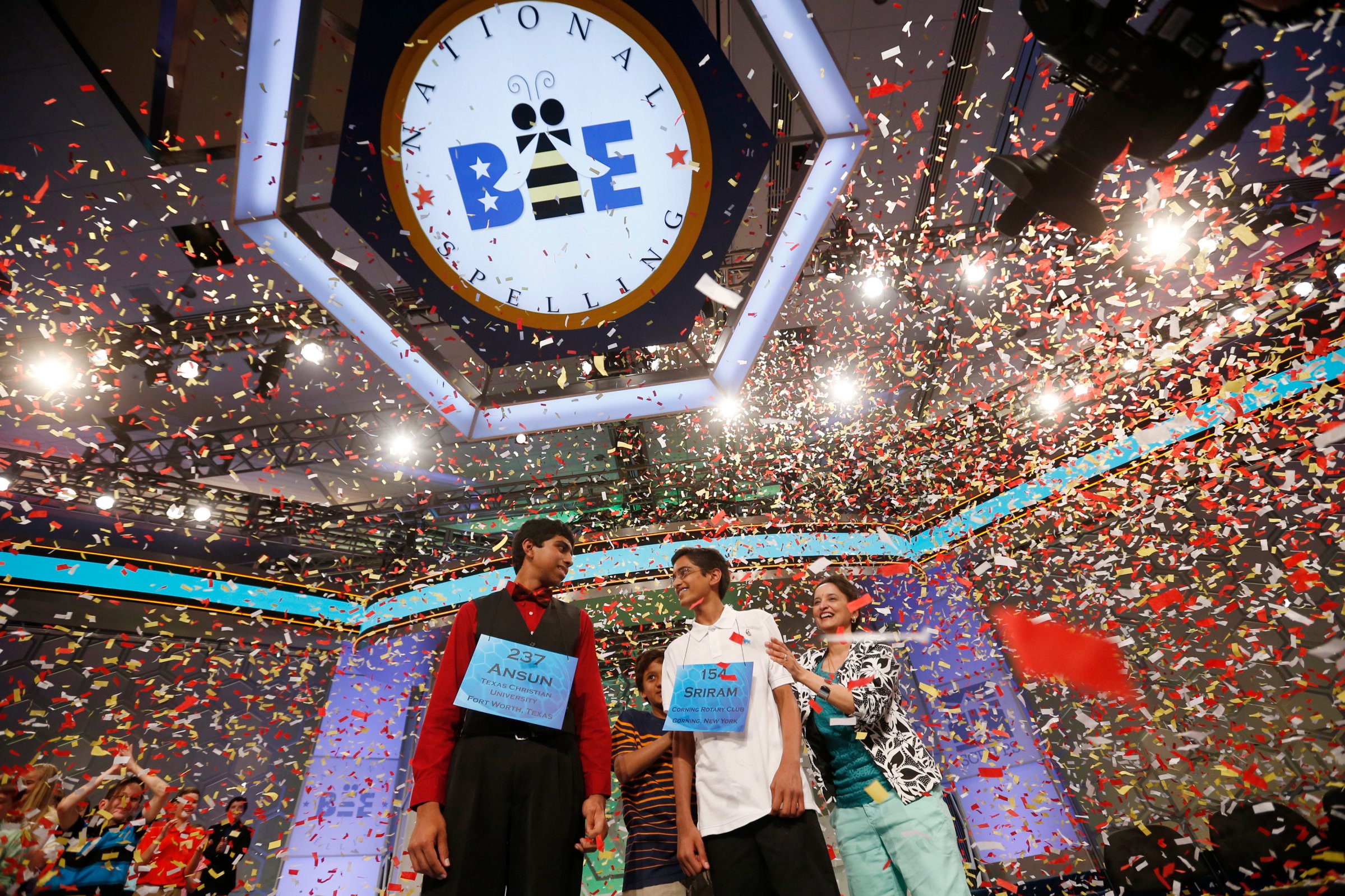 Hathwar stands next to his mother as he and Sujoe are joint winners of the 87th annual Scripps National Spelling Bee at National Harbor