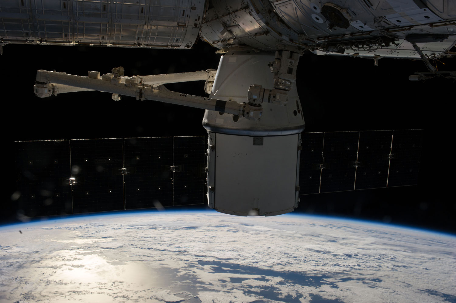 The SpaceX Dragon capsule is berthed at the International Space Station on April 20, 2014 as photographed by the ISS crew members.