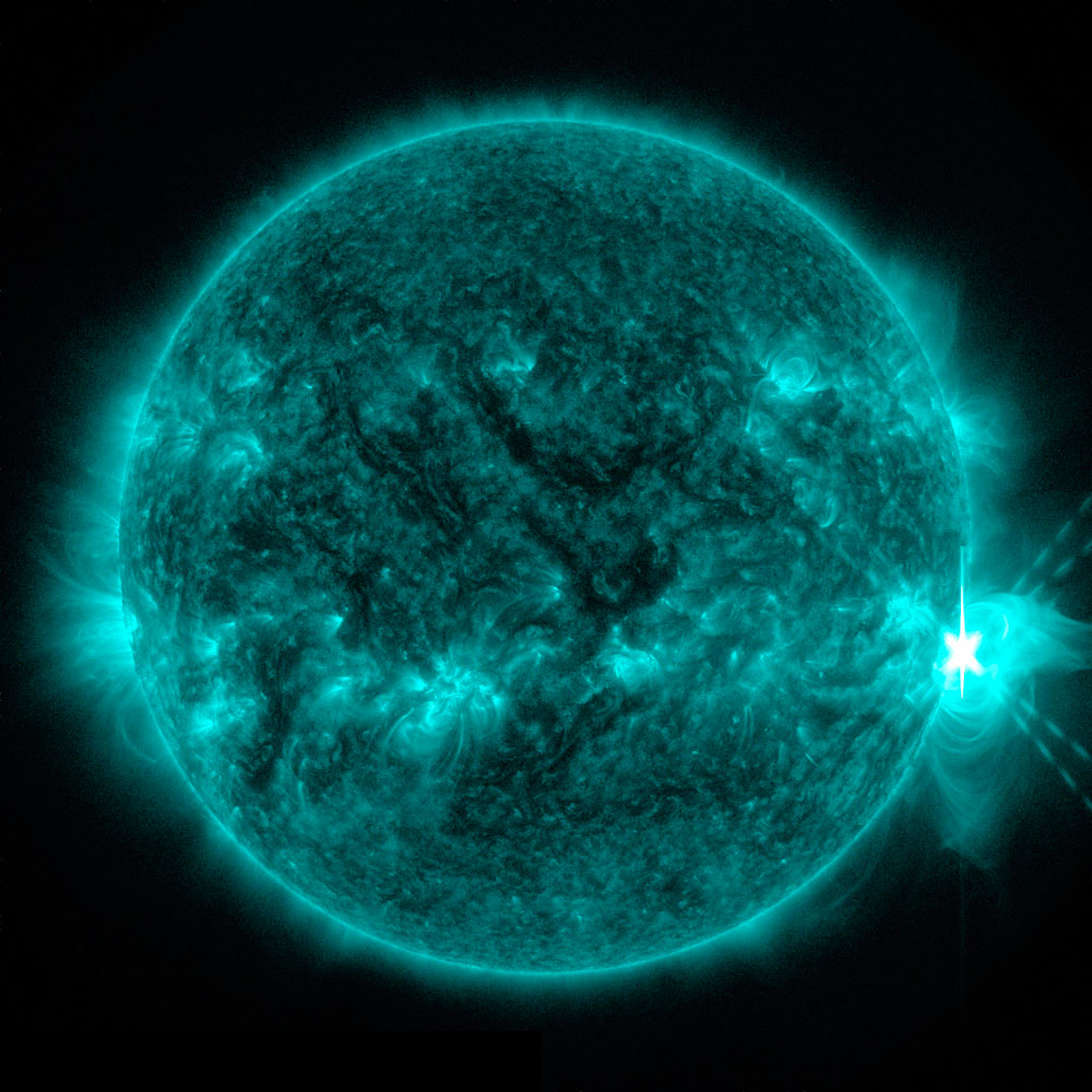 An X-class flare explodes off the right side of the sun in this image captured by NASA's Solar Dynamics Observatory on April 24, 2014.