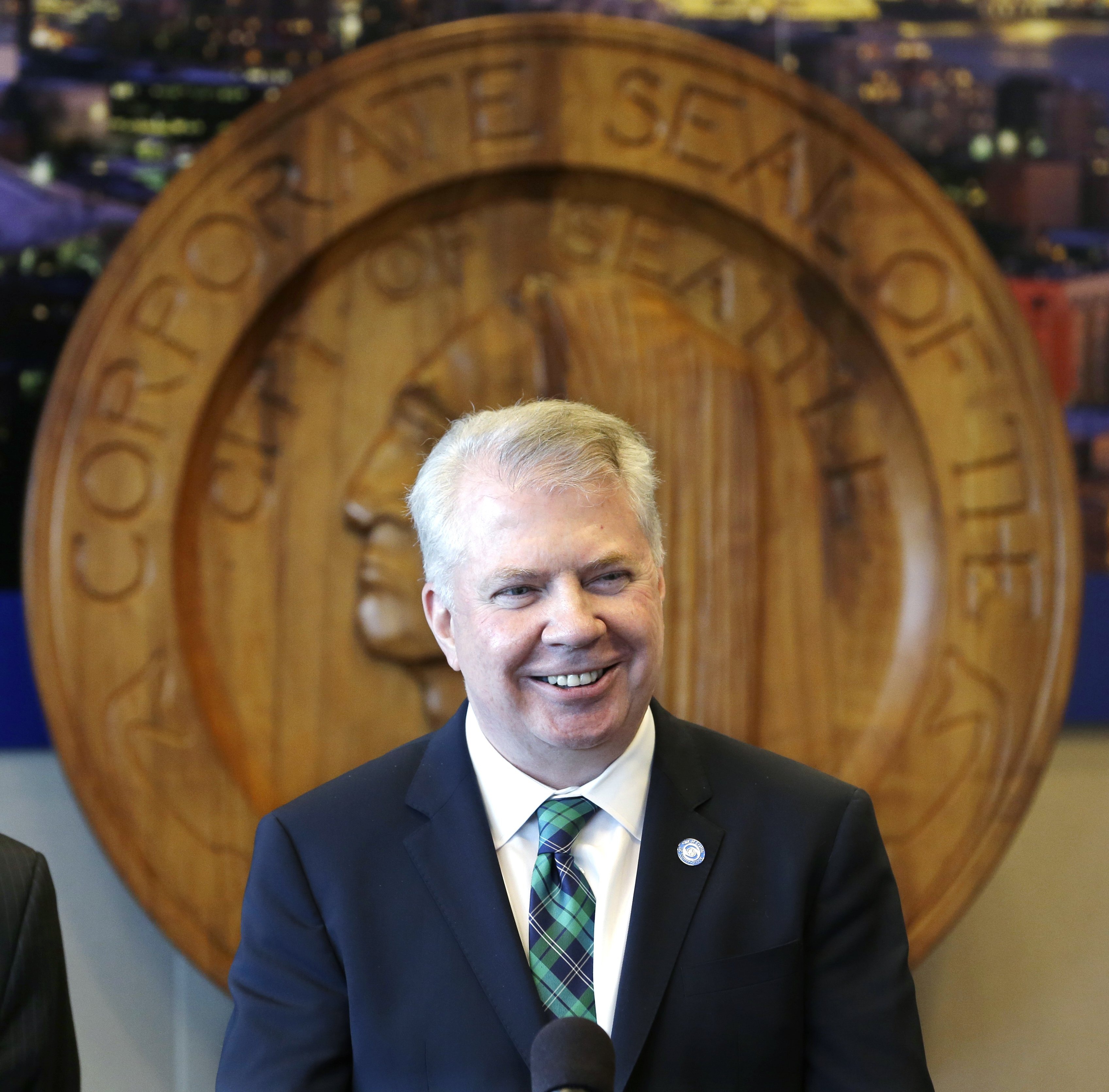 Seattle Mayor Ed Murray smiles as he addresses a news conference on a proposal to increase the minimum wage in the city Thursday, April 24, 2014, in Seattle. (Elaine Thompson&mdash;AP)