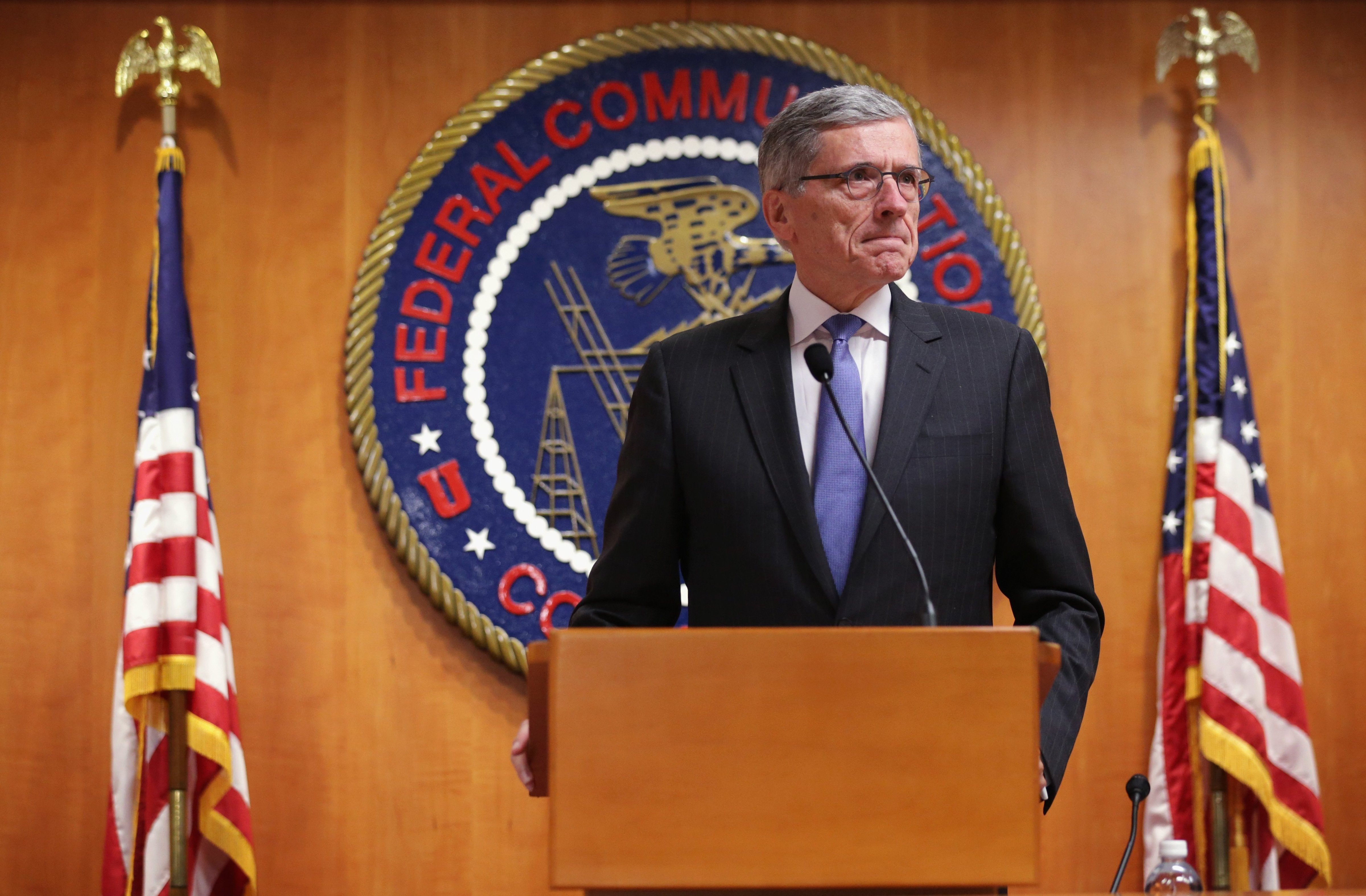 Federal Communications Commission (FCC) Chairman Tom Wheeler listens during a news conference after an open meeting to receive public comment on proposed open Internet notice of proposed rule-making and spectrum auctions on May 15, 2014 at the FCC headquarters in Washington. (Alex Wong—Getty Images)