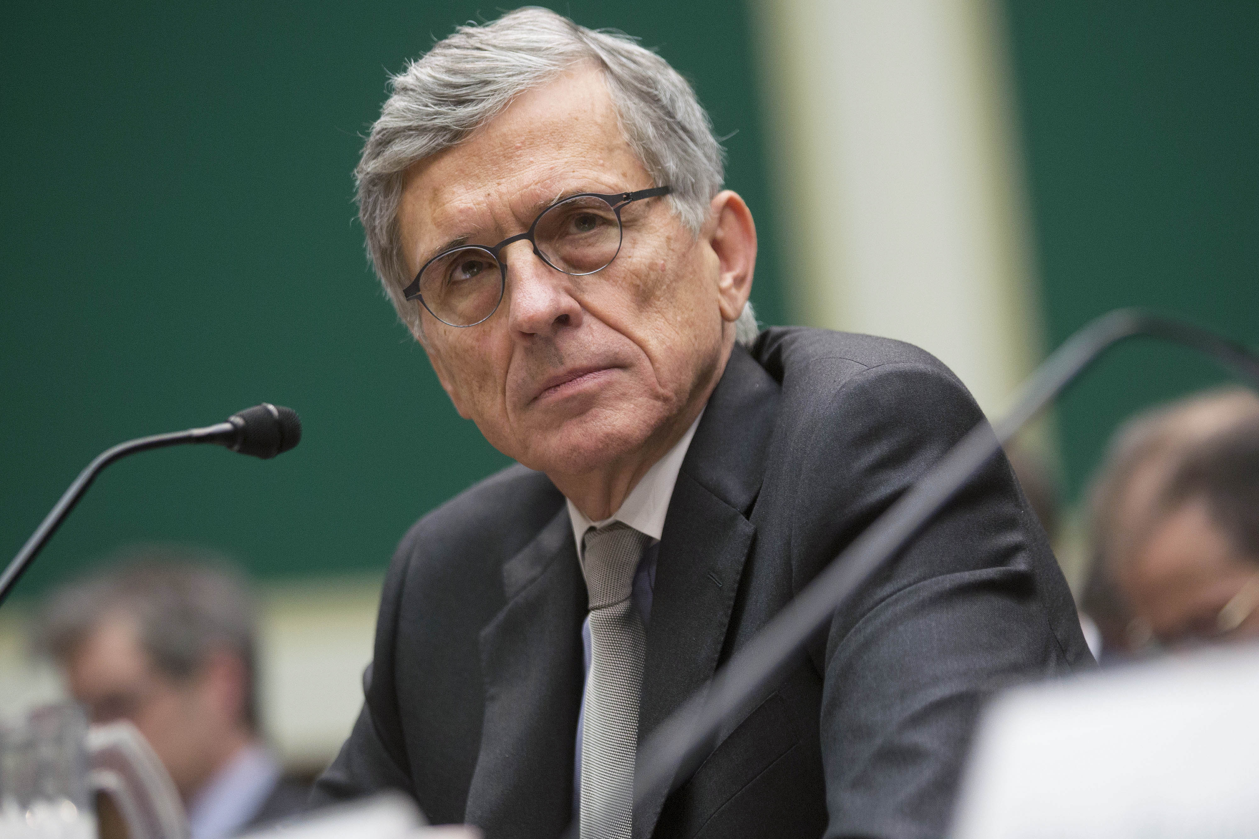 Tom Wheeler, chairman of the FCC, listens during a House Energy and Commerce Committee hearing in Washington on Dec. 12, 2013 (Andrew Harrer—Bloomberg/Getty Images)
