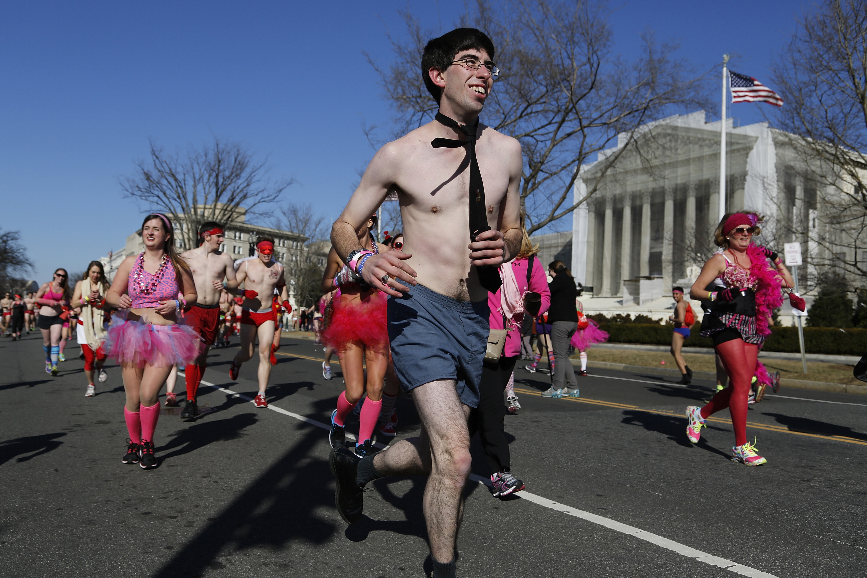 Runners pass the U.S. Supreme Court during the Cupid's Undie Run, which raises money for the Children's Tumor Foundation in Washington on February 9, 2013.