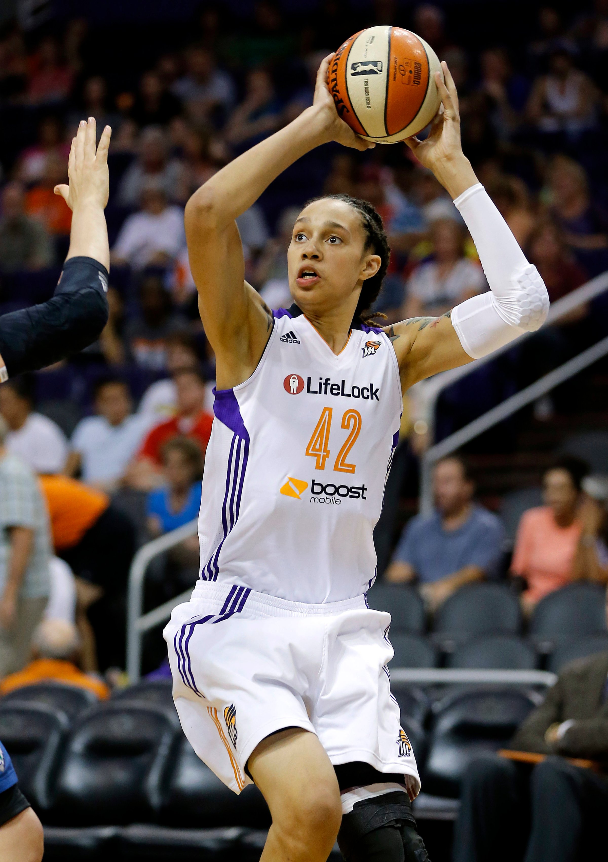 Phoenix Mercury center Brittney Griner shoots against the Minnesota Lynx during the second half of a WNBA basketball game in Phoenix in 2013.