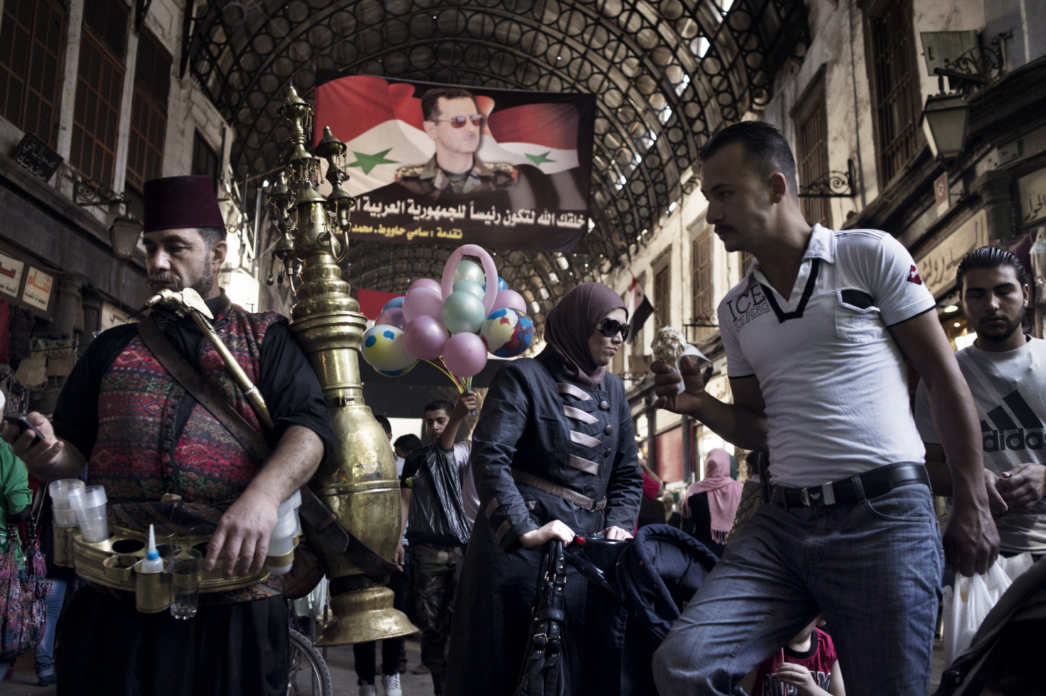 A bustling covered market in Damascus, May 15, 2014.