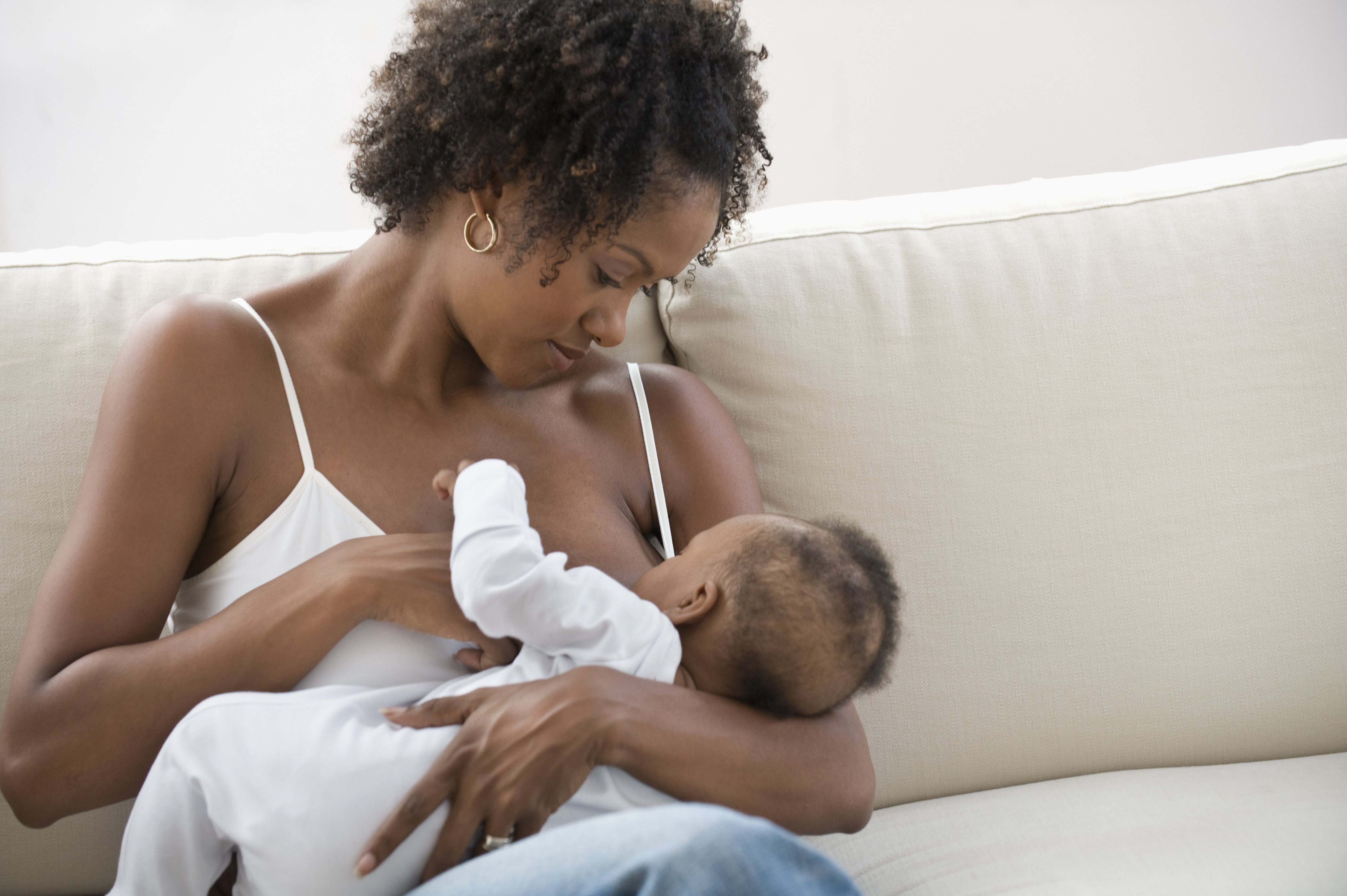 Mother nursing son (SelectStock&mdash;Getty Images/Vetta)