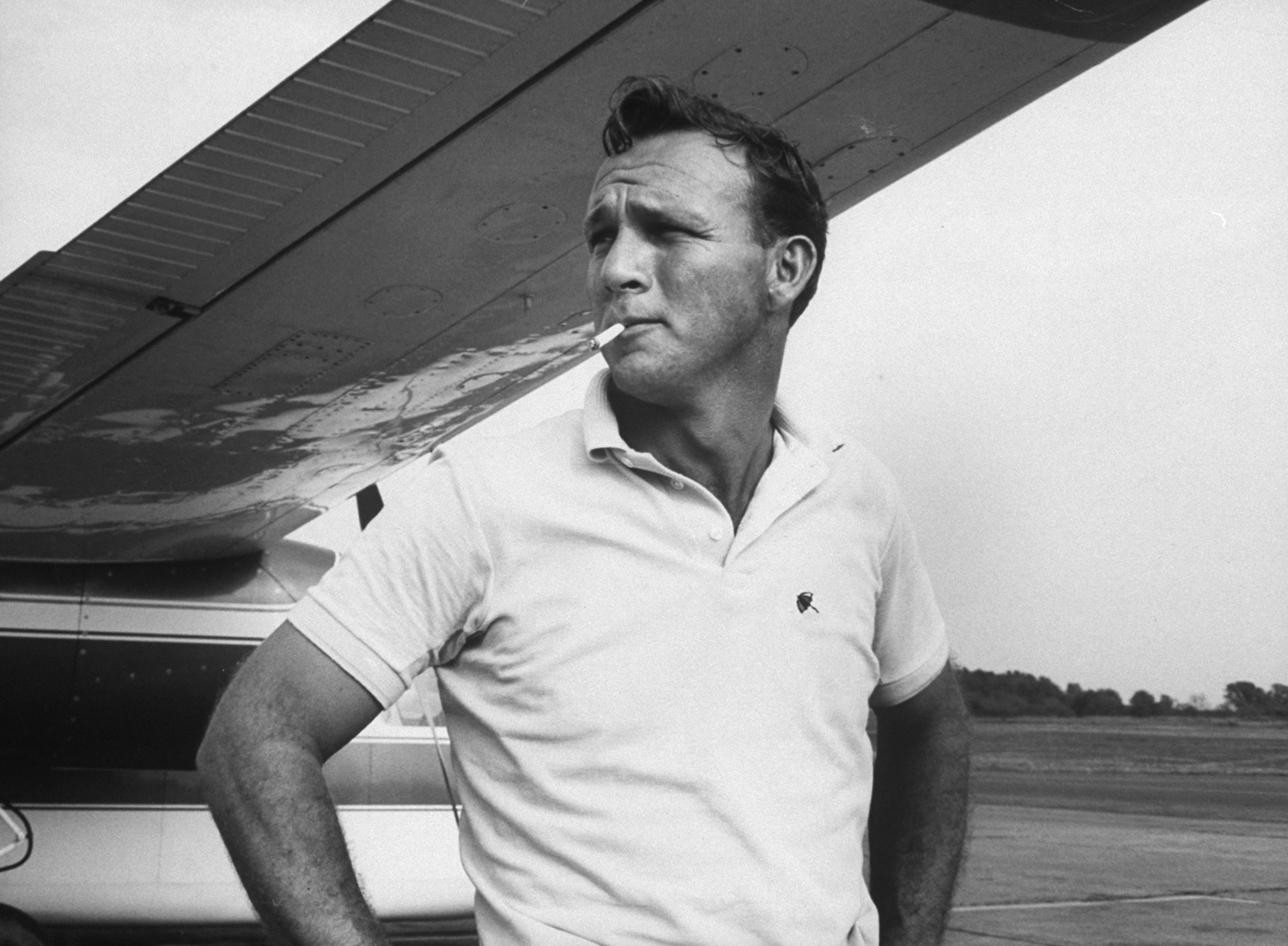 Arnold Palmer in a familiar pose -- with a cigarette -- in 1962. The golf legend quit smoking for good in 1970 -- an achievement he ranks with his best.