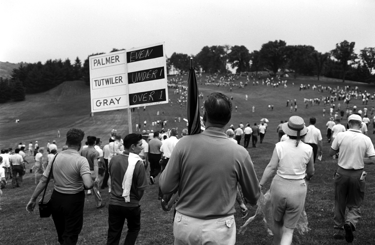 Crowd following Arnold Palmer, 1962.