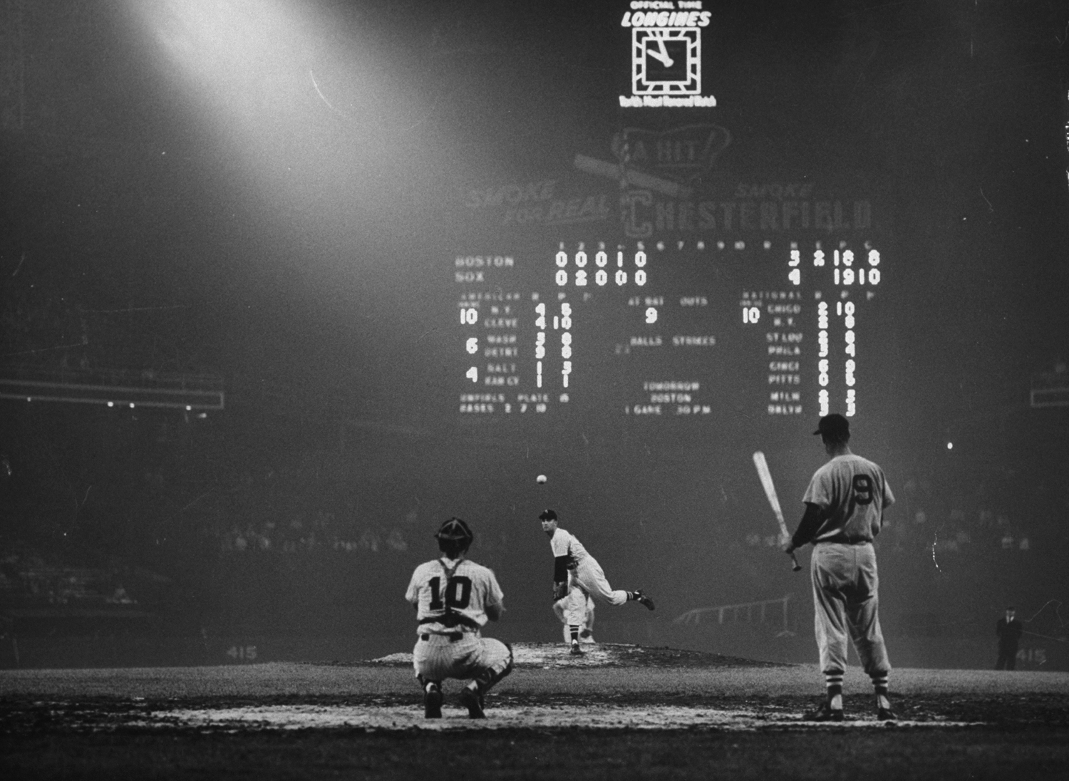 Ted Williams waits while pitcher warms up at Comiskey Park, 1957.