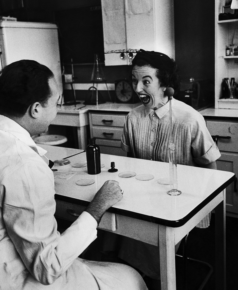 In 1954 in Northbrook, Ill., Mrs. Jane Dill has just been told that, judging from the response of a chemical wafer on her tongue, she is going to have a baby girl.