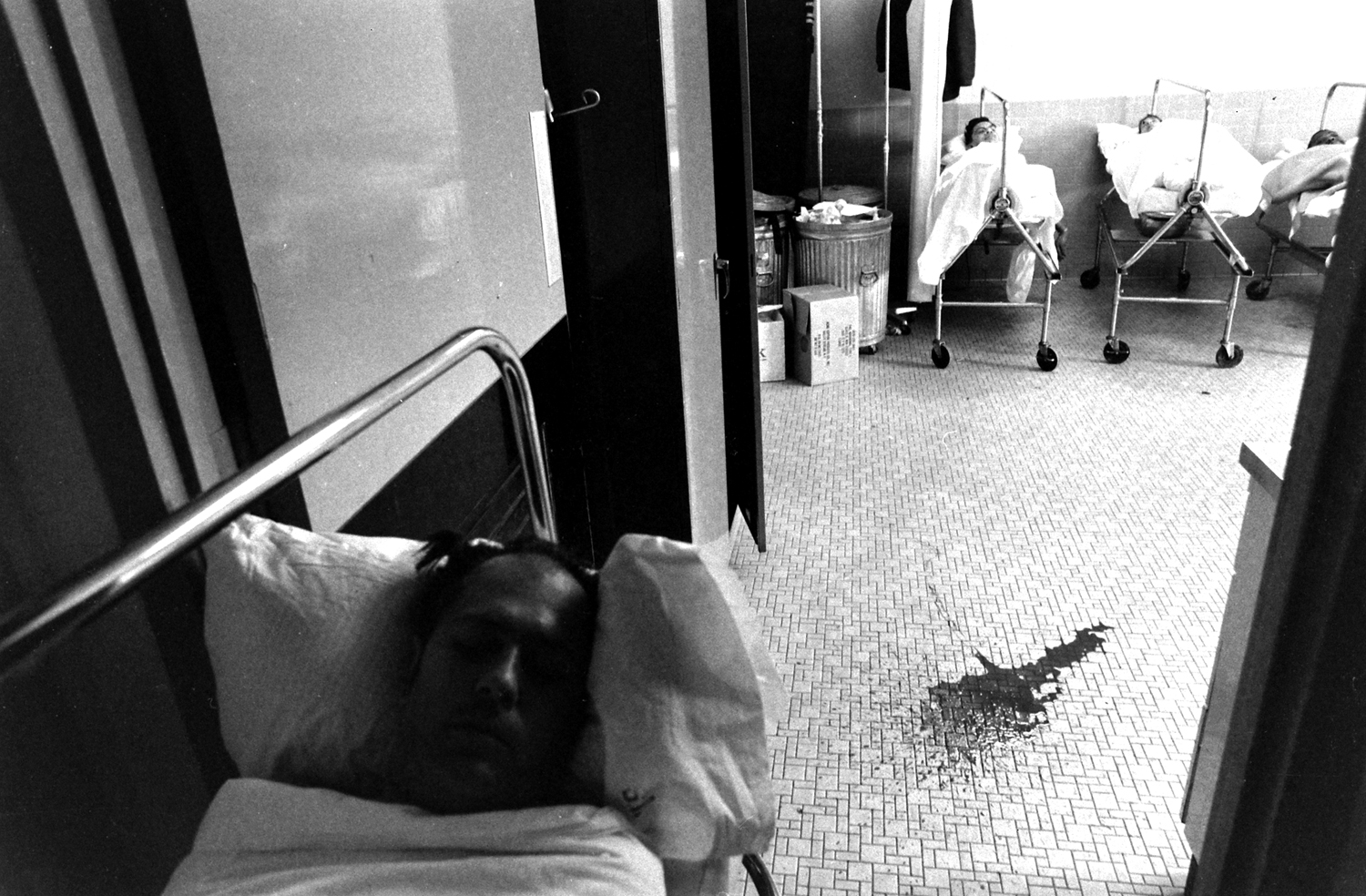 In an enema room of the Bronx VA Hospital in New York, disabled spinal injury patients wait up to four hours to be attended by a single aide, 1970.