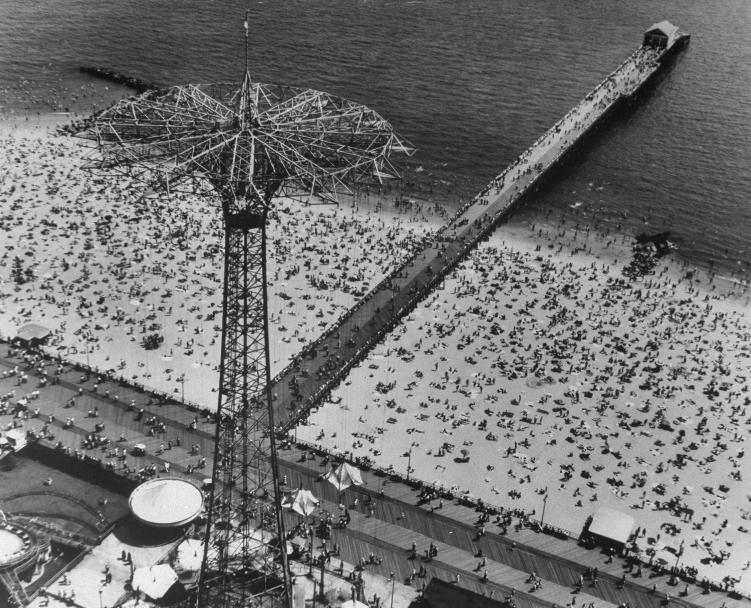 The Parachute Jump along the boardwalk at Coney Island, 1951.