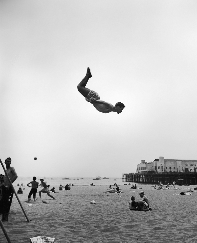 A man flies off a trampoline, Santa Monica, 1948.