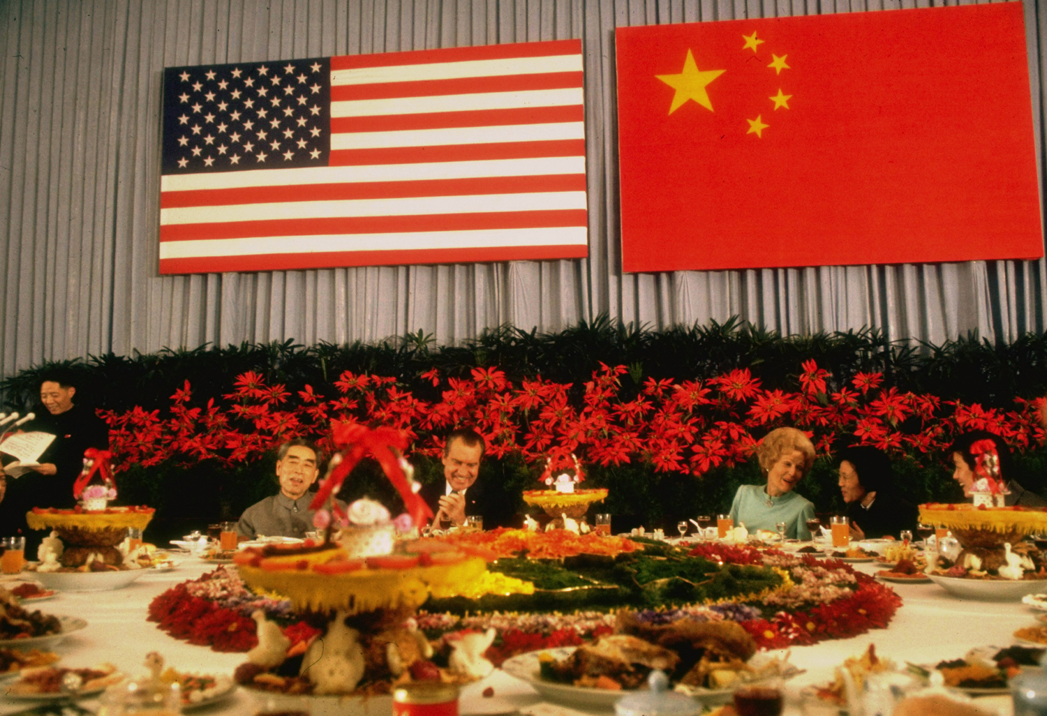 Chinese Premier Chou En-lai, President Richard Nixon, Pat Nixon and Mrs. Chou En-lai at an official banquet during Nixon's landmark visit to China in 1972.