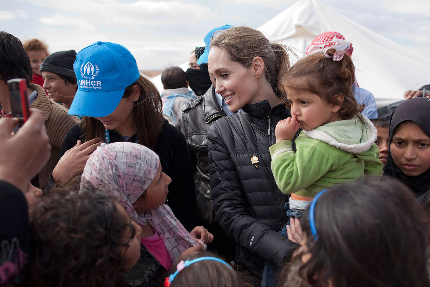Angelina Jolie meets with refugees at the Zaatari refugee camp on Dec. 6, 2012 outside of Mafraq, Jordan.