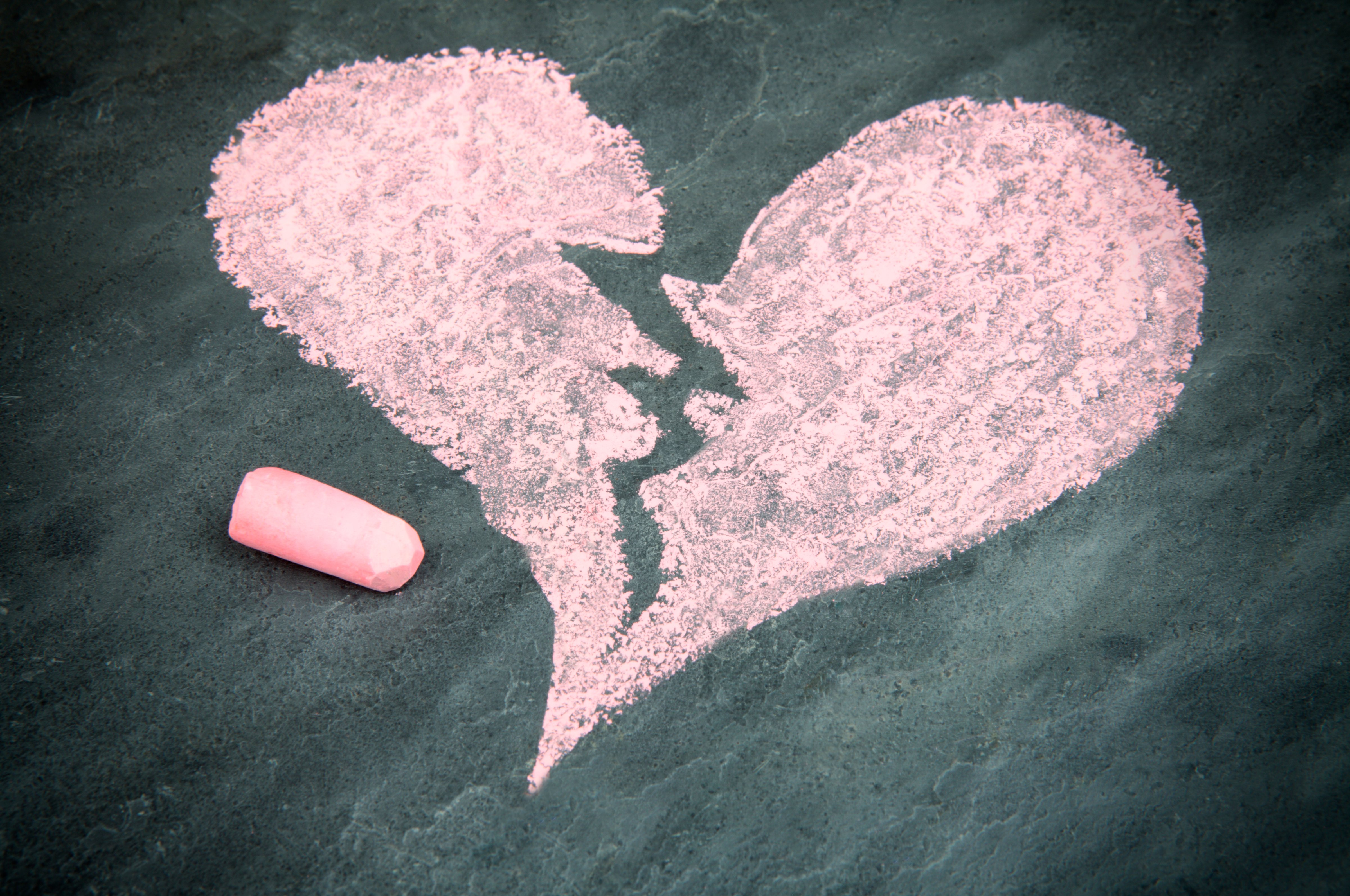 Broken heart drawn in chalk (Neil Overy&mdash;Getty Images)