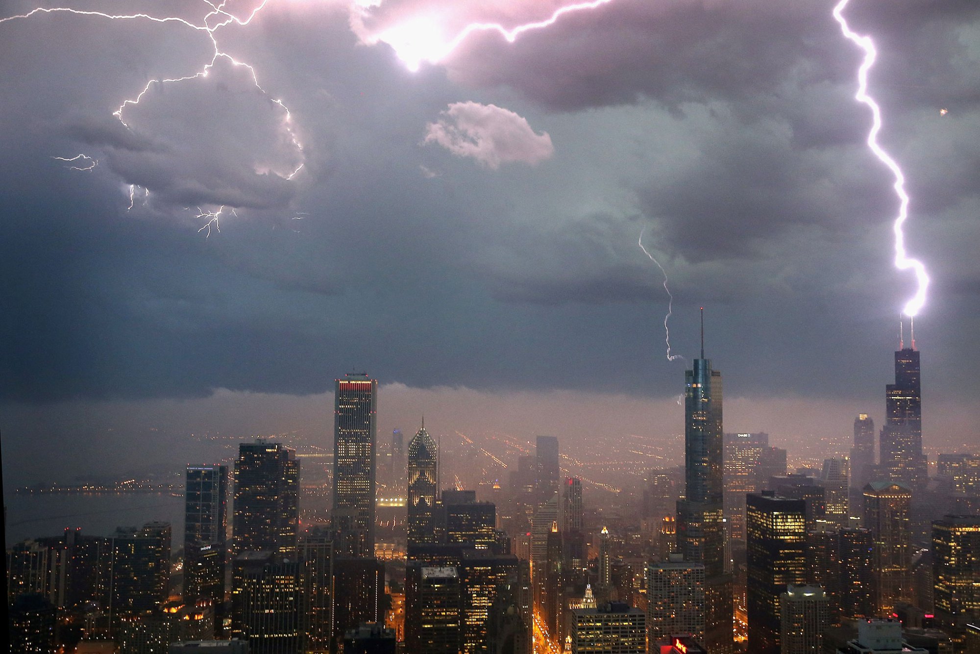 Lightning strikes the Willis Tower in downtown on June 12, 2013 in Chicago.