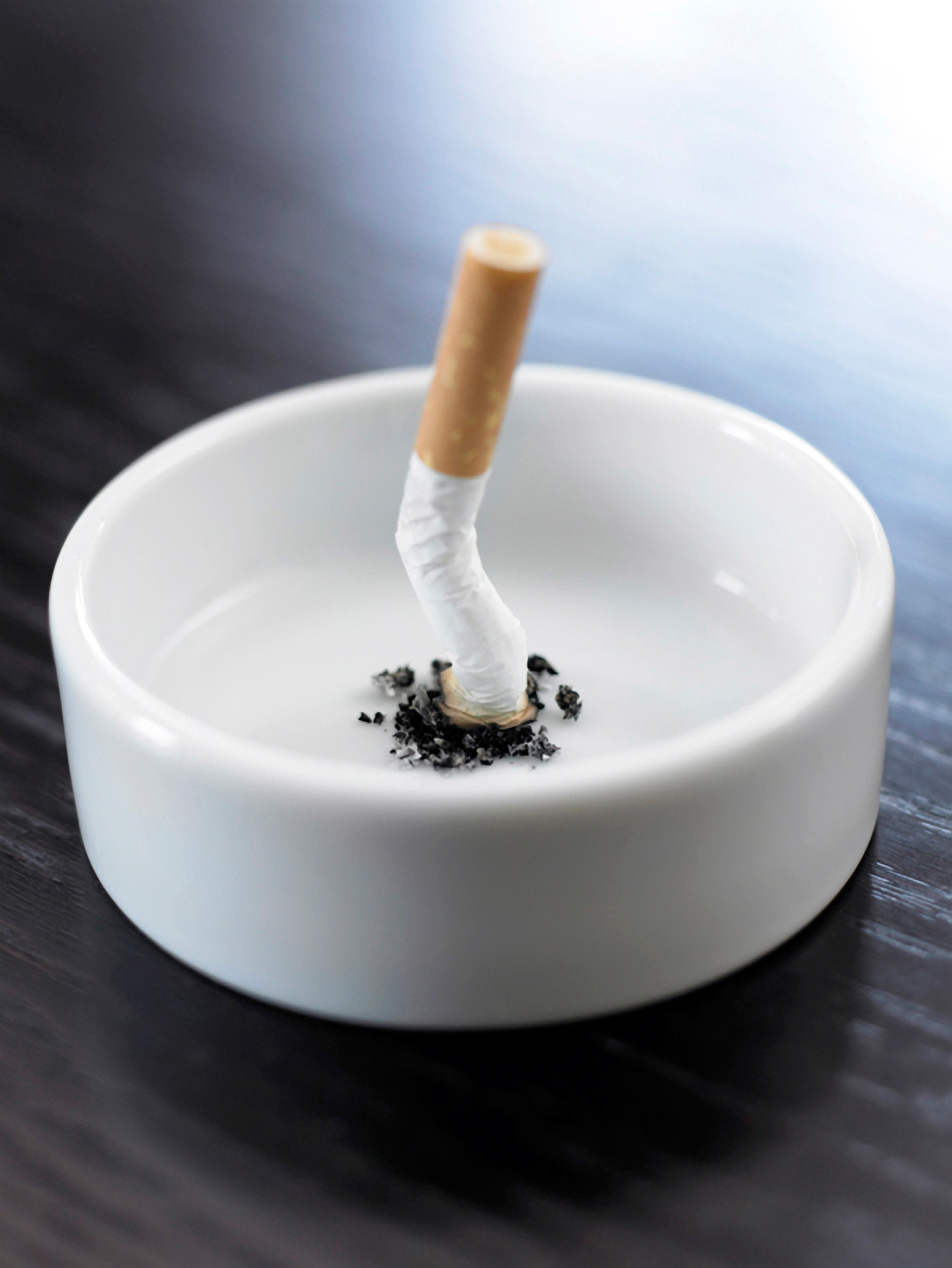 Stubbed out cigarette in ashtray. (Getty Images/OJO Images RF— Adam Gault)