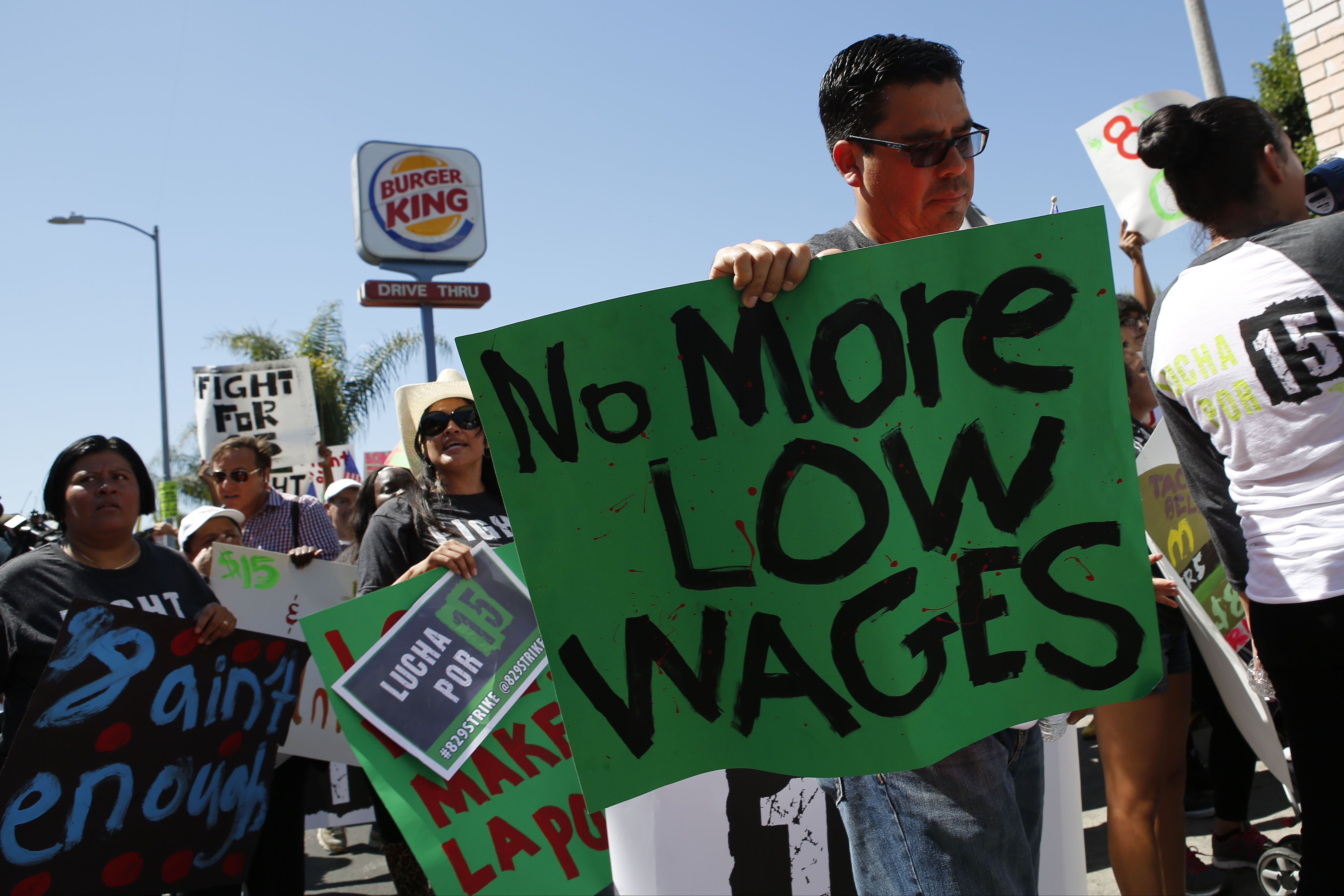 Fast-food workers and supporters organized by the Service Employees International Union (SEIU) protest outside of a Burger King Worldwide Inc. restaurant in Los Angeles, California, U.S., on Thursday, Aug. 29, 2013. (Bloomberg&mdash;Bloomberg via Getty Images)