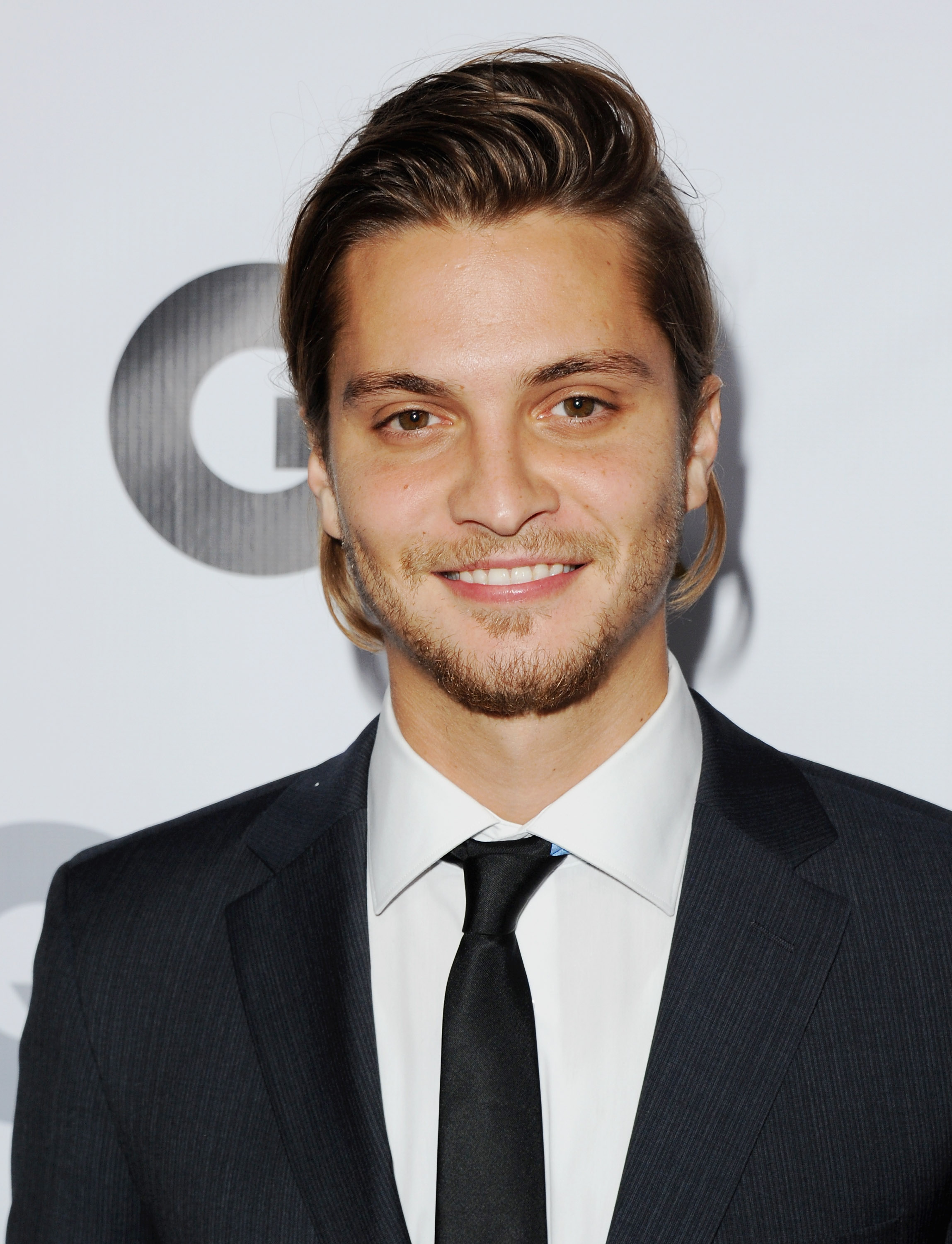 Actor Luke Grimes arrives at GQ Celebrates The 2013 