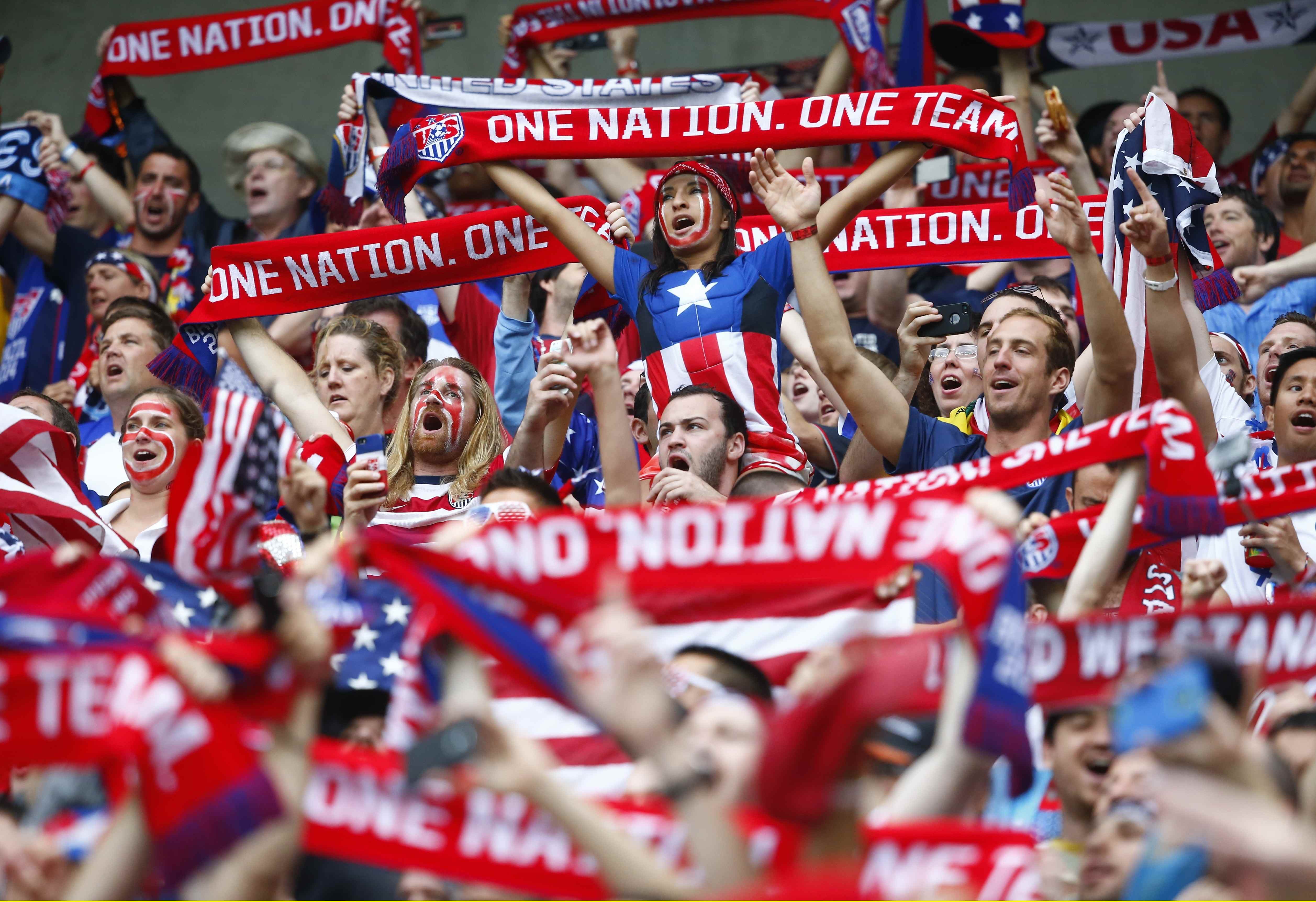 U.S. fans cheer before the start of the 2014 World Cup Group G soccer match against German at the Pernambuco arena in Recife June 26, 2014.
