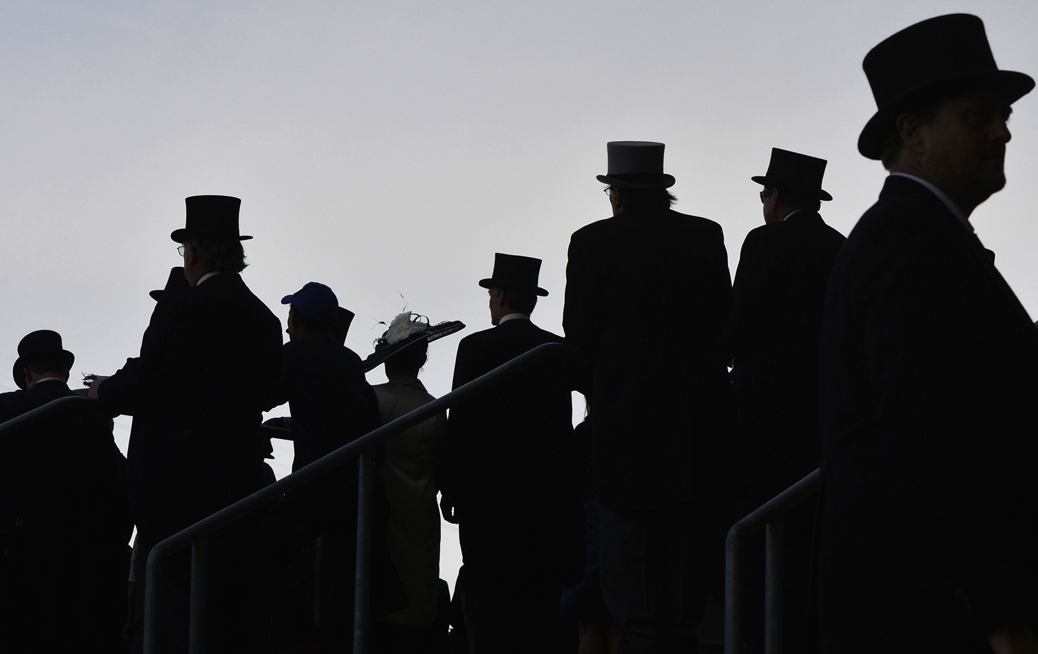 Racegoers attend the first day of the Royal Ascot horse racing festival at Ascot