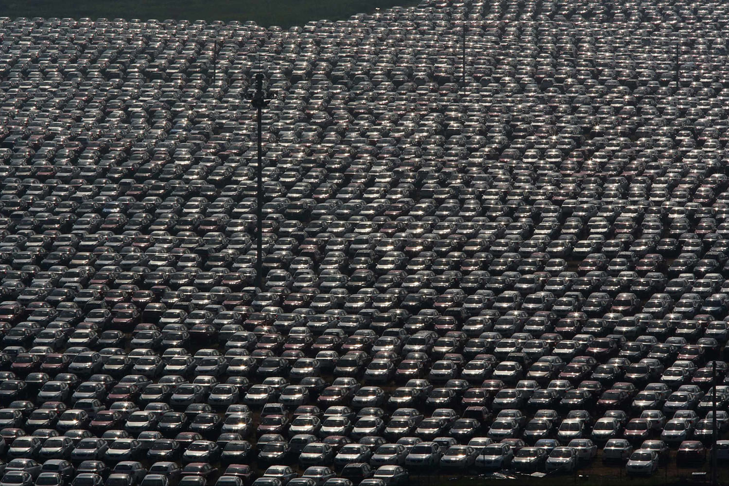 New vehicles park at a Chinese automobile factory in Shenyang