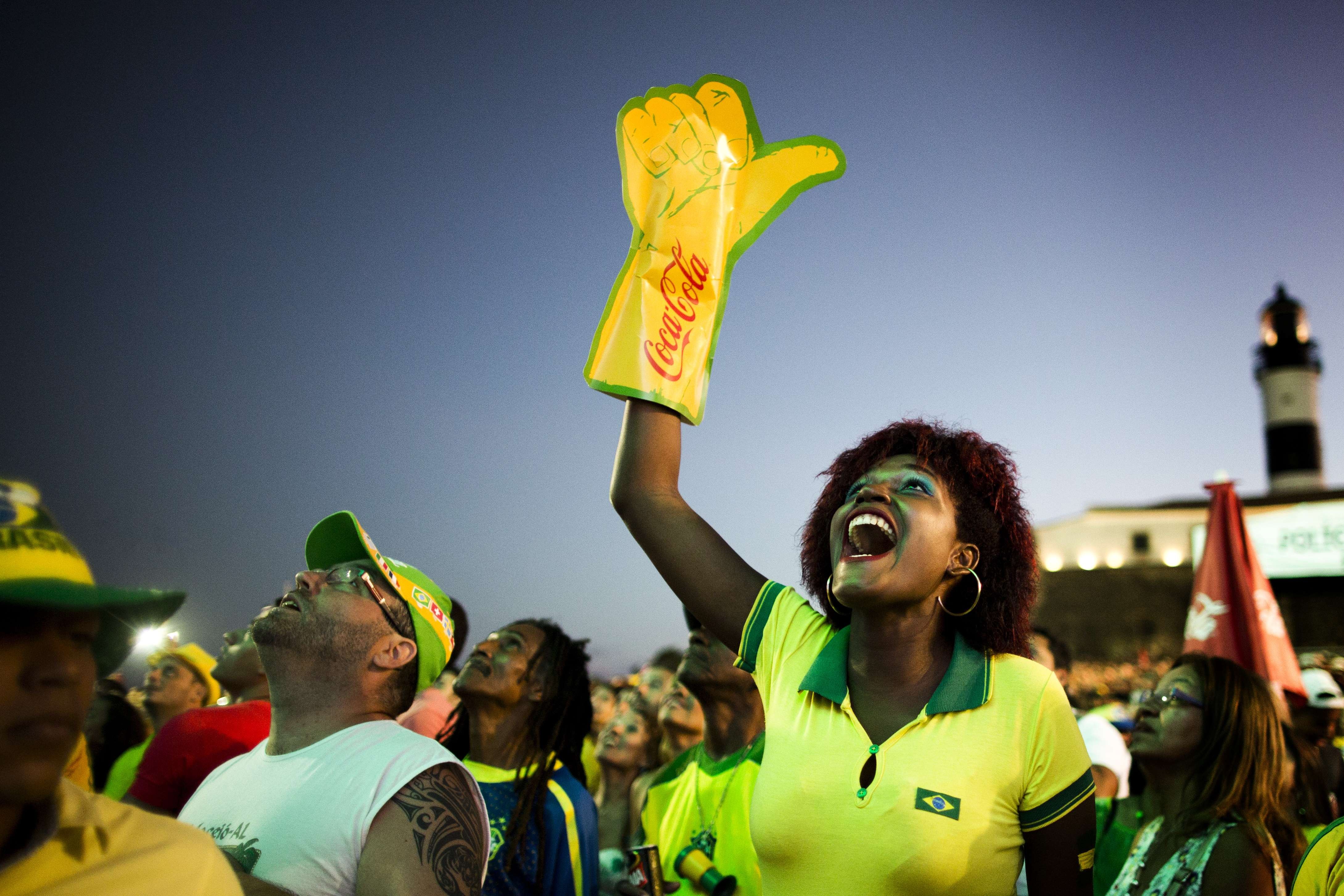 Brazil supporters cheer at FIFA Fan Fest in Salvador, Brazil on June 23, 2014, during the group A match between Brazil and Cameron.