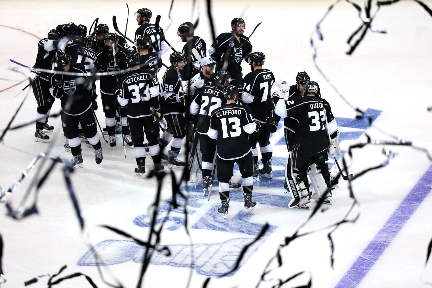 The Los Angeles Kings  celebrate their overtime game-winning goal against the New York Rangers during Game One of the 2014 NHL Stanley Cup Final in Los Angeles on June 4, 2014.