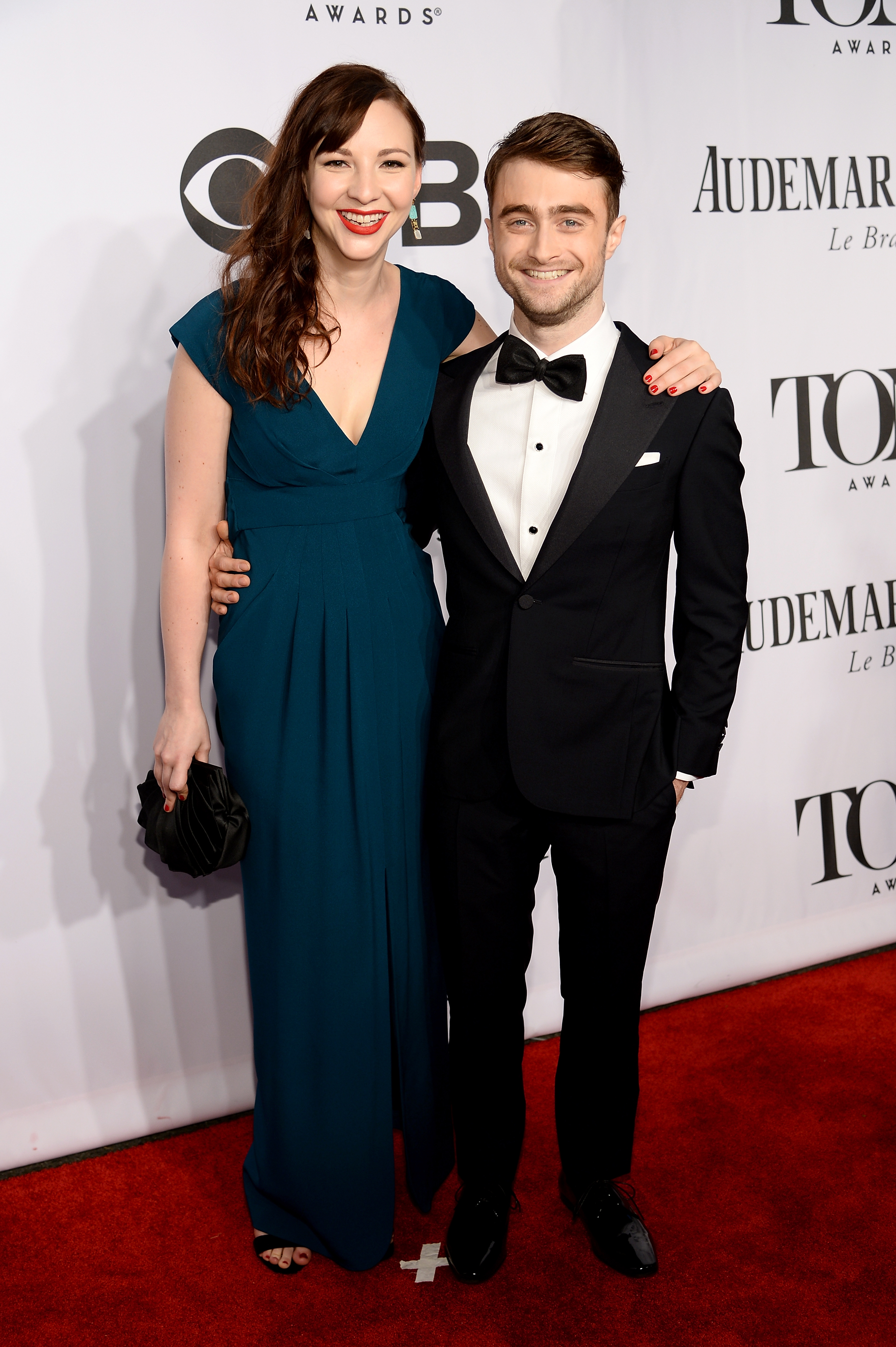 Erin Darke and Daniel Radcliffe attend the 68th Annual Tony Awards at Radio City Music Hall on June 8, 2014 in New York City.
