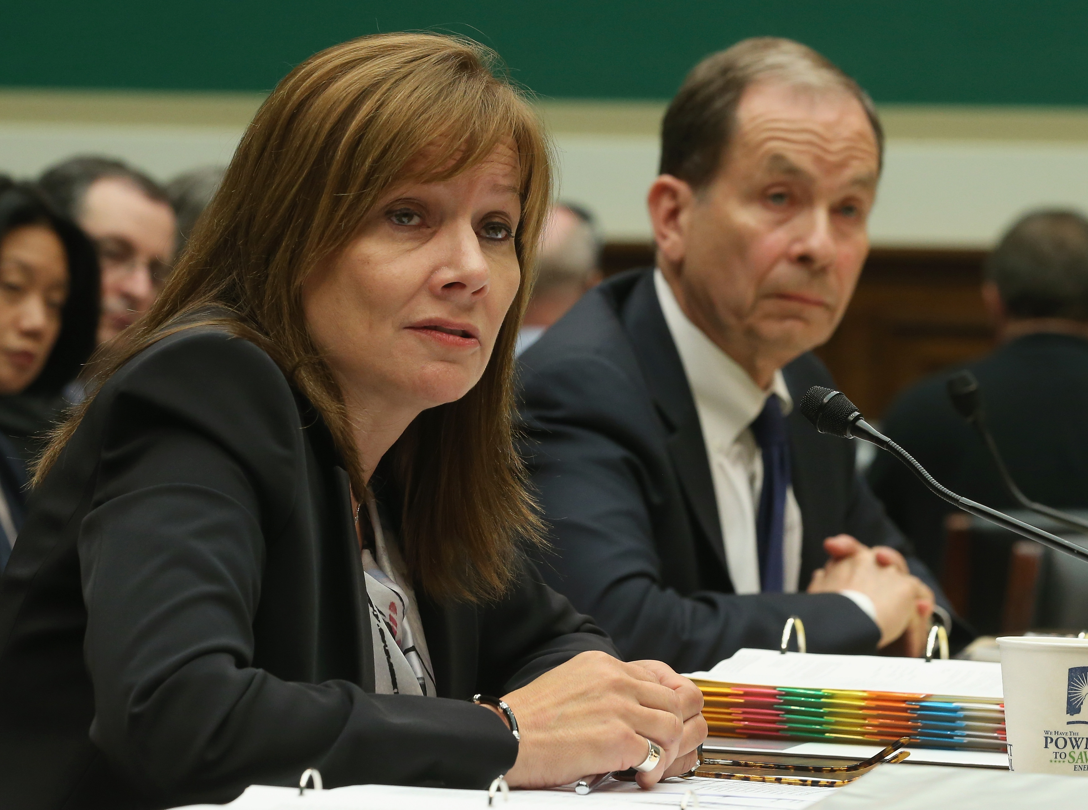 General Motors CEO Mary Barra (L), and Anton Valukas, head of GM's internal recall investigation, field questions while testifying during a House Energy and Commerce Committee hearing on Capitol Hill on June 18, 2014 in Washington, DC. (Mark Wilson—Getty Images)