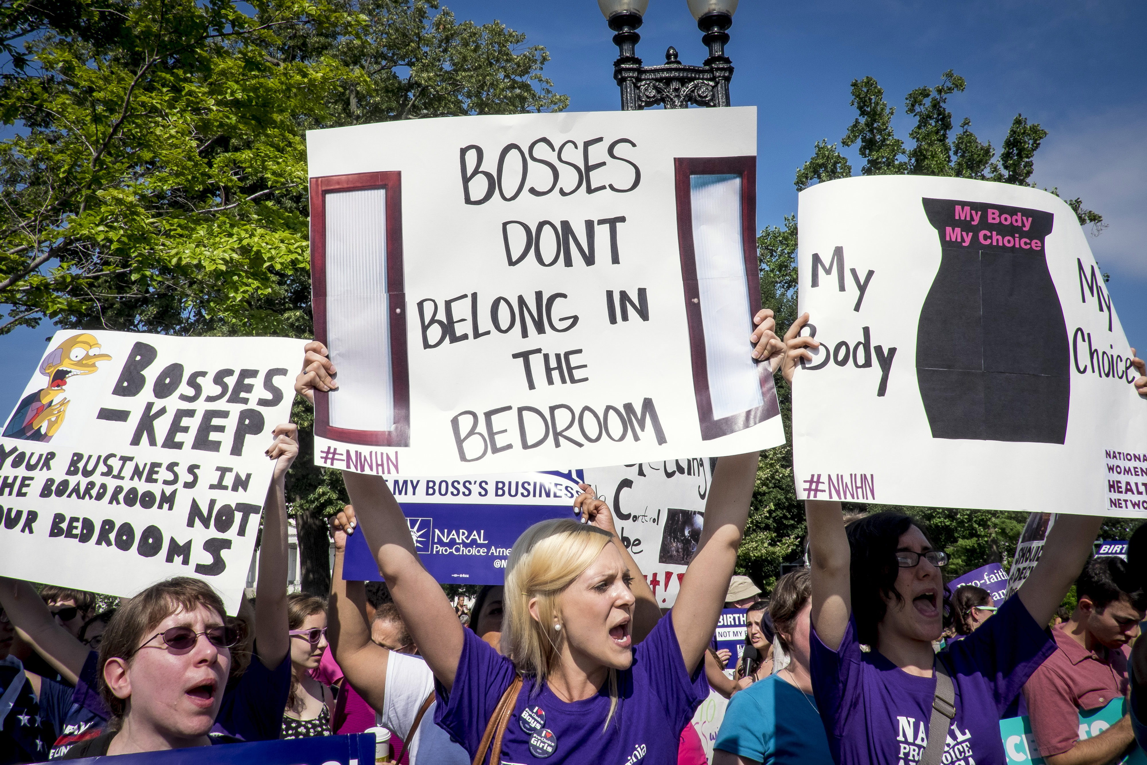 Activists who support the Affordable Care Act's employer contraceptive mandate demonstrate outside of the U.S. Supreme Court in Washington, D.C., U.S., on Monday, June 30, 2014. (Bloomberg&mdash;Bloomberg via Getty Images)
