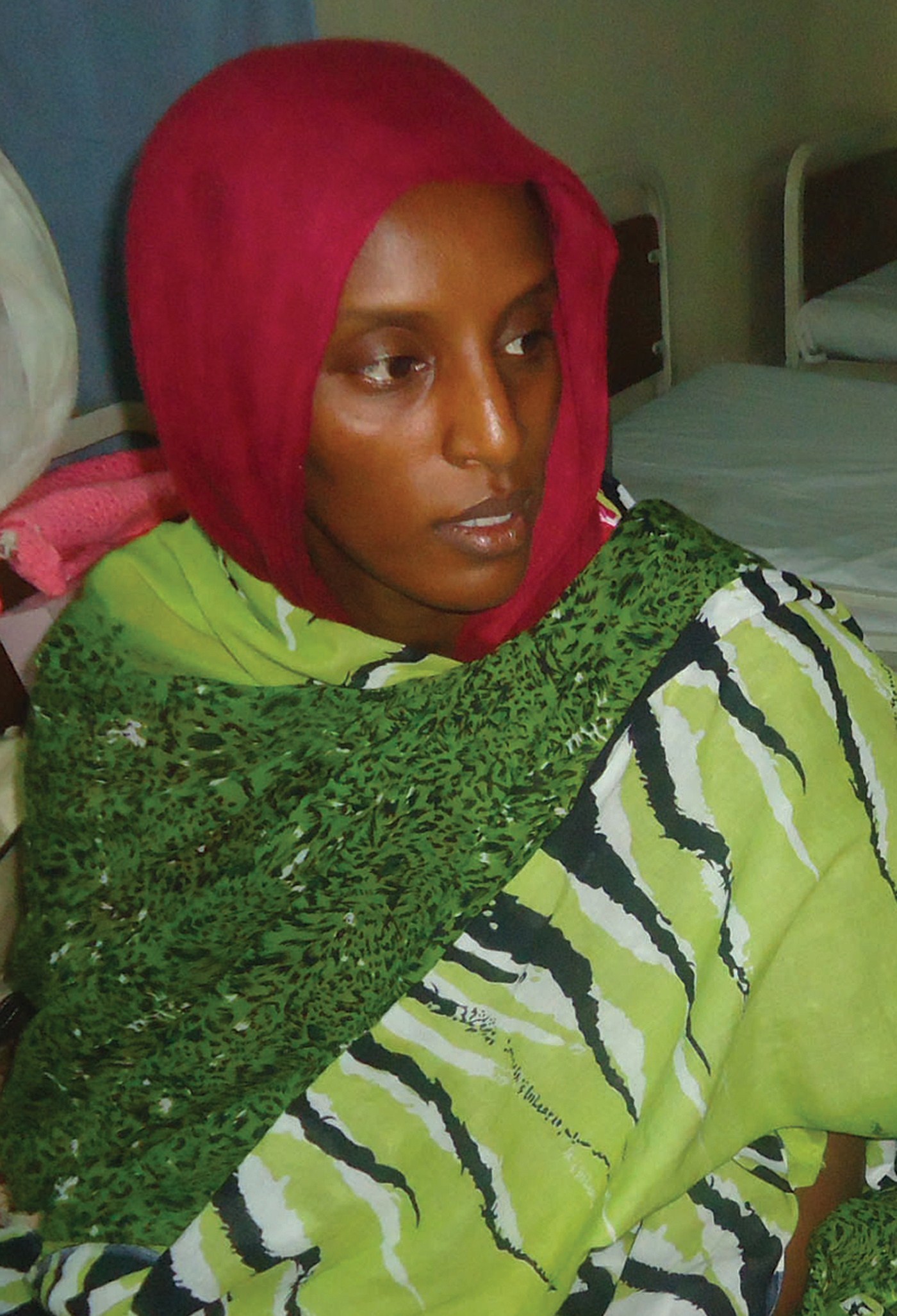 Meriam Ibrahim sits in her cell a day after she gave birth to a baby girl at a women's prison in Omdurman on May 28, 2014.