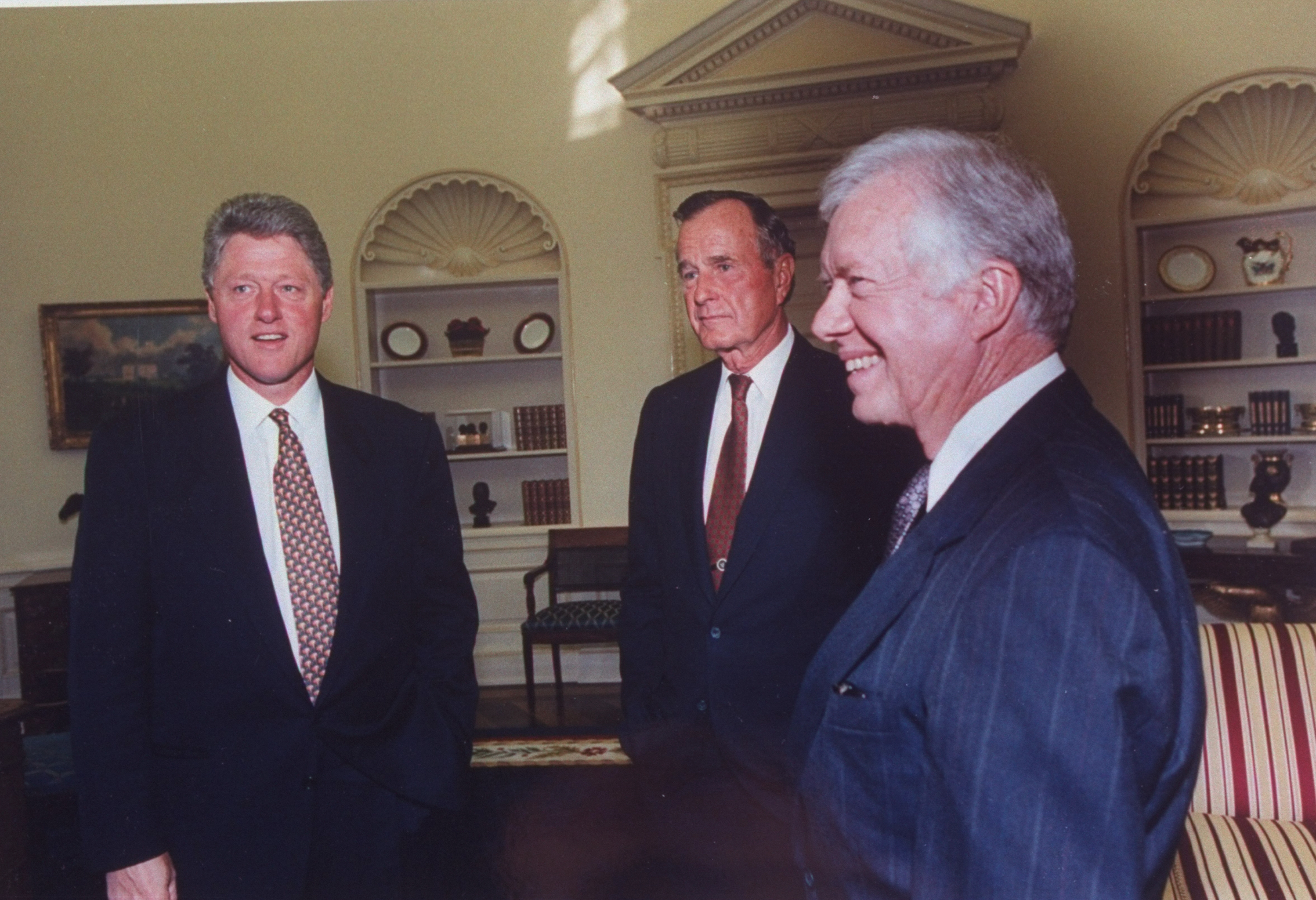 Pres. Bill Clinton (L) w. former Presidents Jimmy Carter (R) &amp; George Bush in Oval Office, 2 being among invitees to the White House Israel/PLO peace accord signing ceremony. (Time Life Pictures&mdash;Time &amp; Life Pictures/Getty Image)