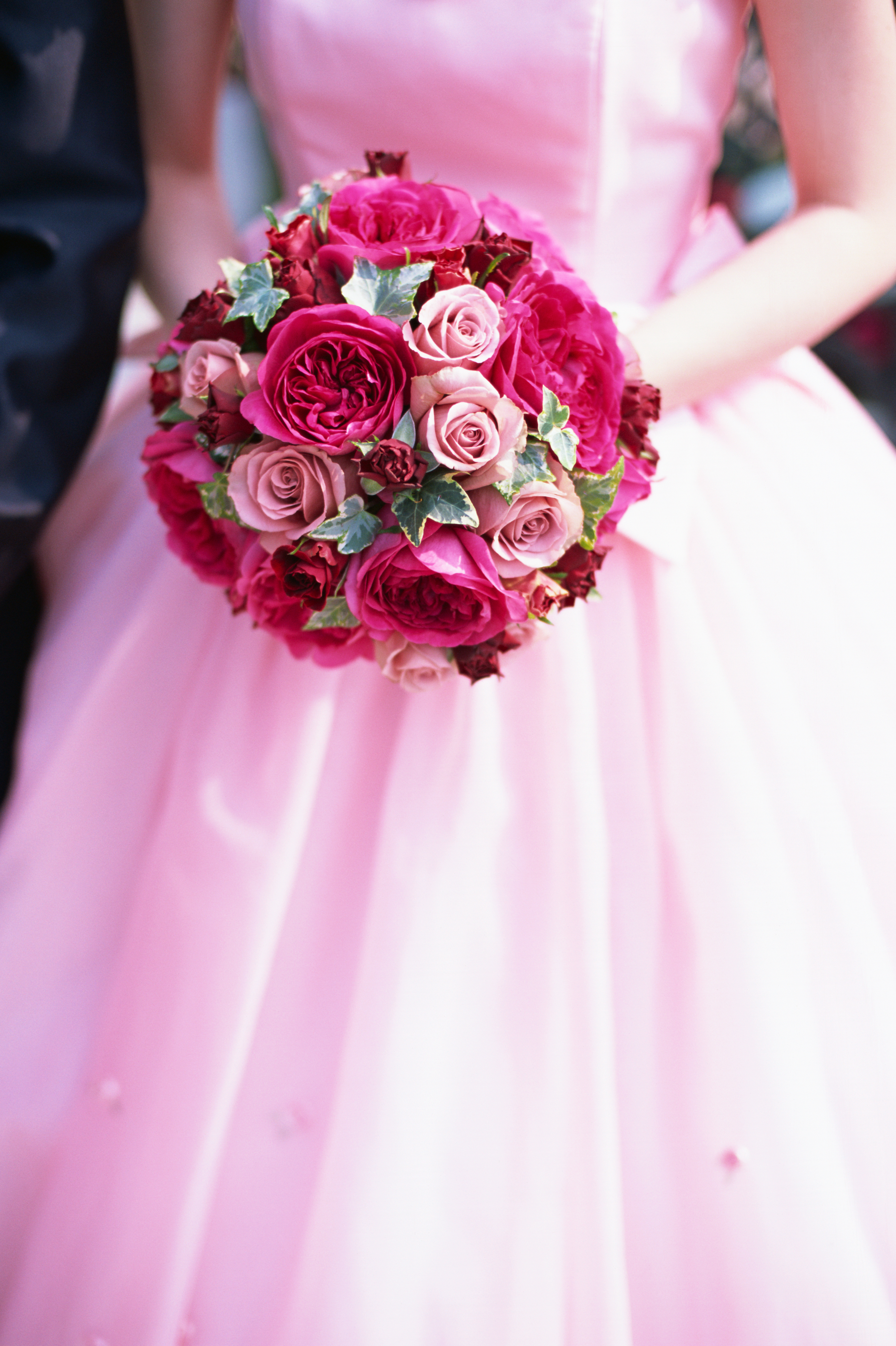 A pink bride holding a pink bouquet (MIXA&amp;mdash;Getty Images/MIXA)