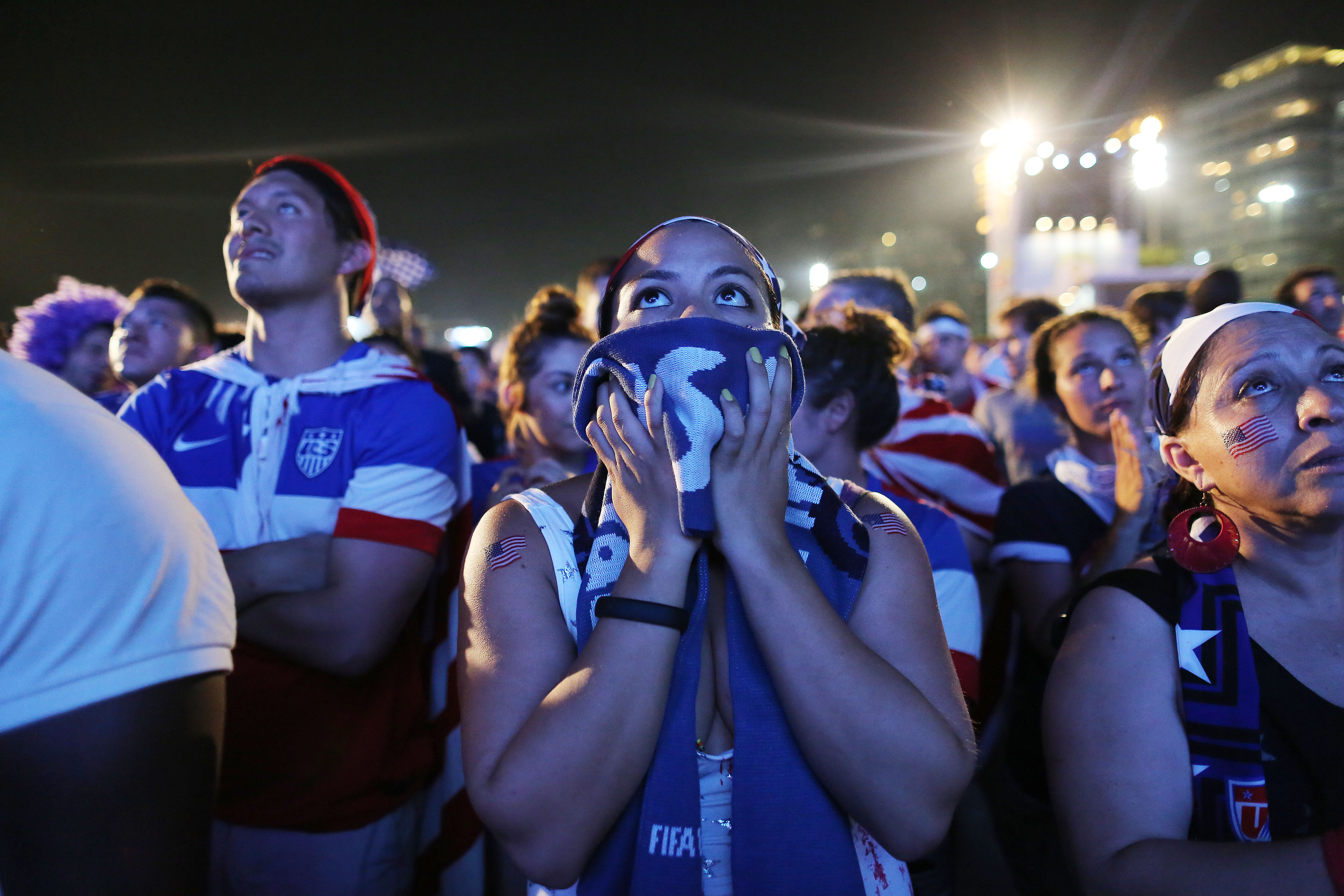 U.S. fans watch a live broadcast of the match between USA and Ghana, inside the FIFA Fan Fest area on Copacabana beach, Rio de Janeiro on June 16, 2014.