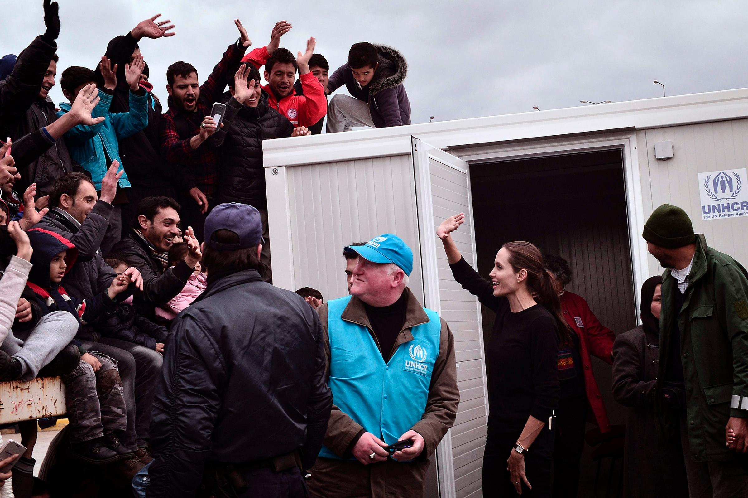 UNHCR's Goodwill Ambassador Angelina Jolie Pitt greets refugees and migrants during her visit to the port of Piraeus, Greece, March 16, 2016. She urged the international community to respond to Europe's worst refugee crisis since World War II with generosity and not the "politics of fear."