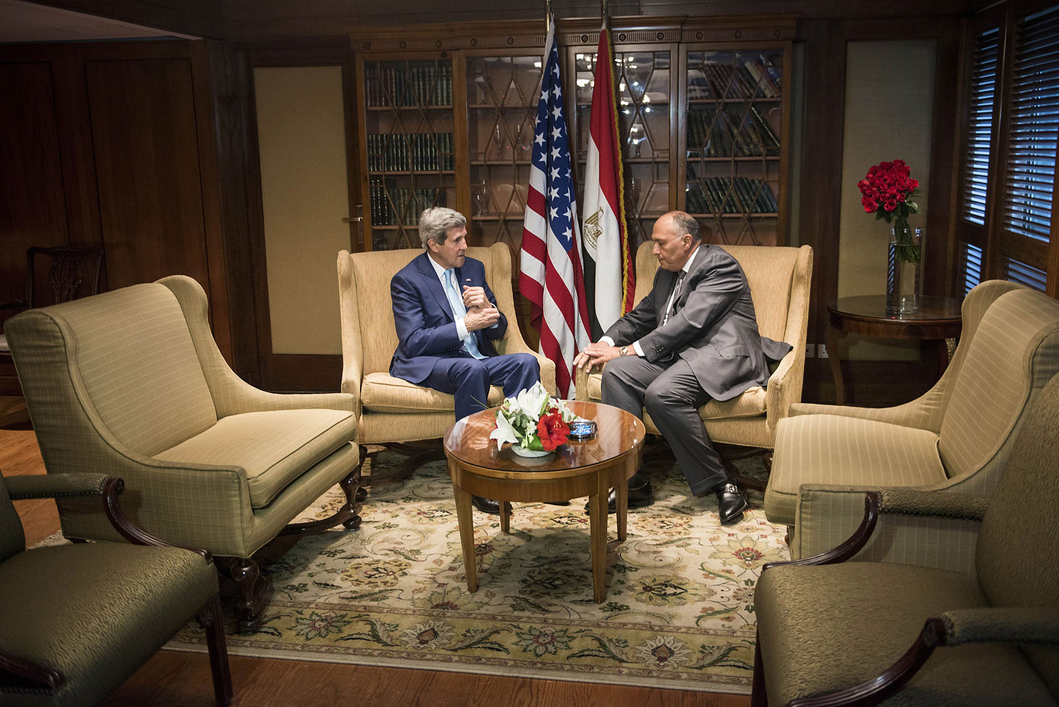 U.S. Secretary of State John Kerry, left, meets with Egyptian Foreign Minister Sameh Shukri in Cairo on June 22, 2014 (Brendan Smialowski—AP)