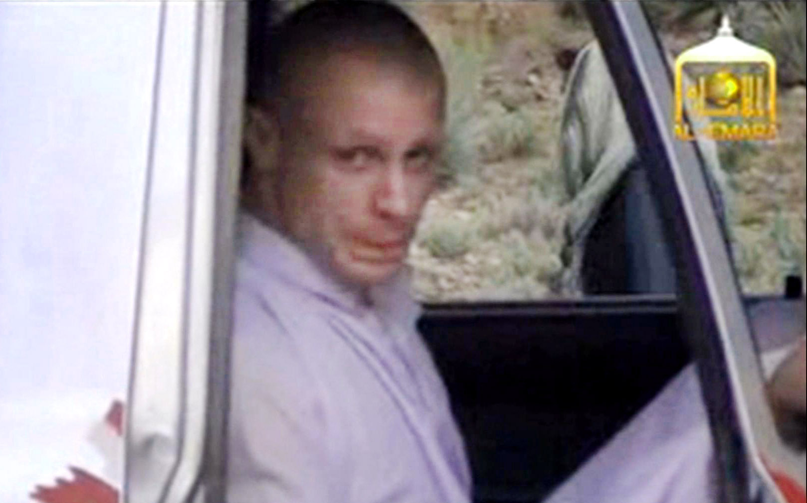 In this image taken from video obtained from Voice Of Jihad Website, which has been authenticated based on its contents and other AP reporting, Sgt. Bowe Bergdahl sits in a vehicle guarded by the Taliban in eastern Afghanistan. (Uncredited—AP)