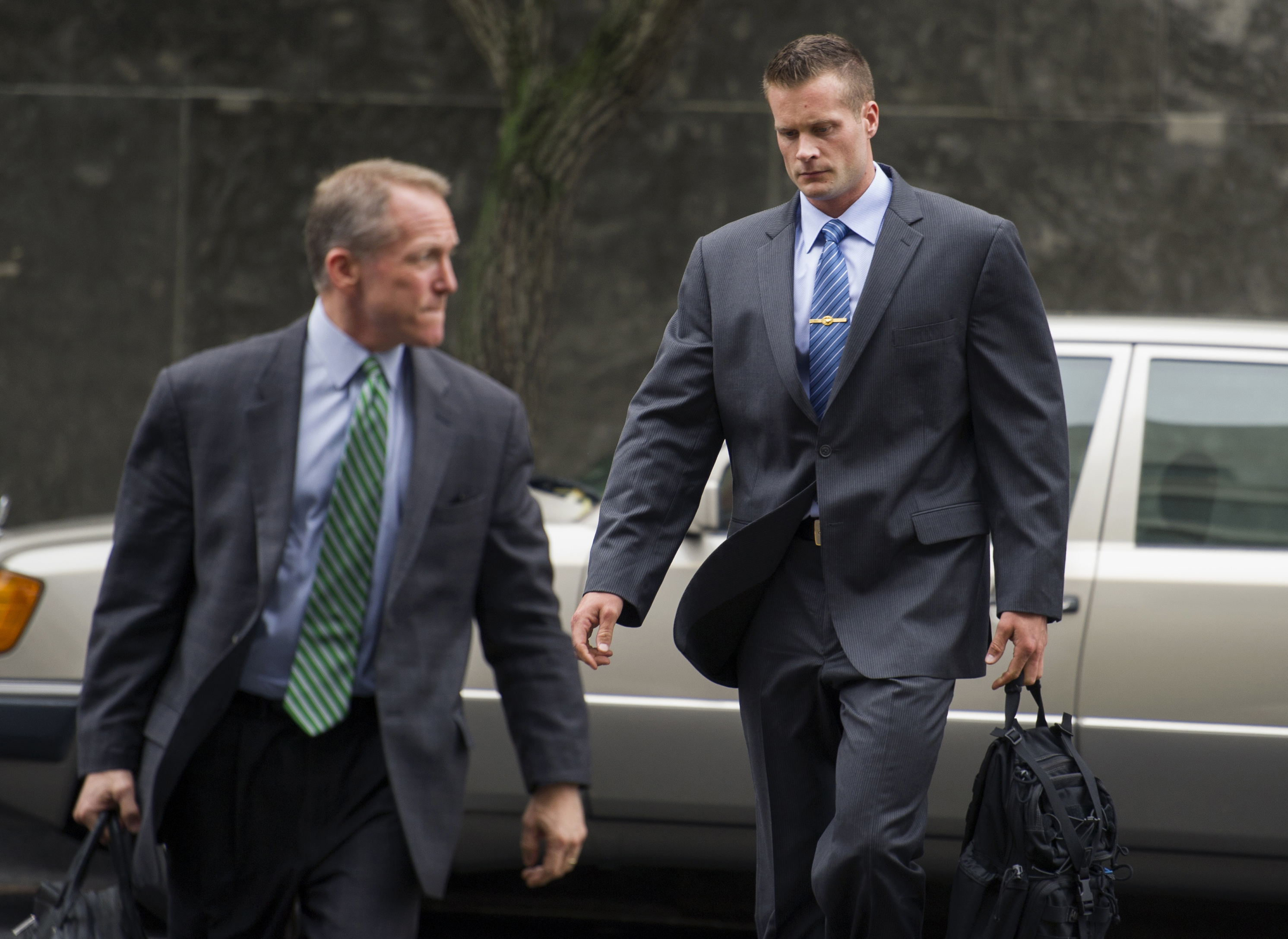 Former Blackwater guard Evan Liberty, right, arrives at a federal court in Washington to stand trial on June 11, 2014 (Cliff Owen—ASSOCIATED PRESS)