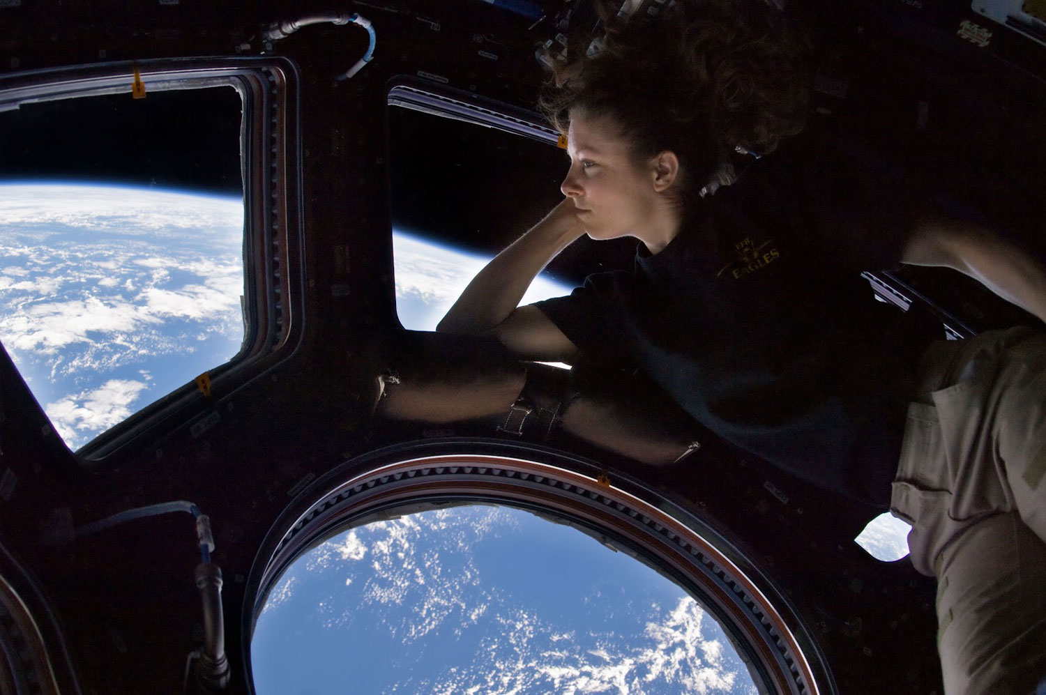 NASA astronaut Tracy Caldwell Dyson looks out from ESA's Cupola observatory on the International Space Station on May 8, 2014.