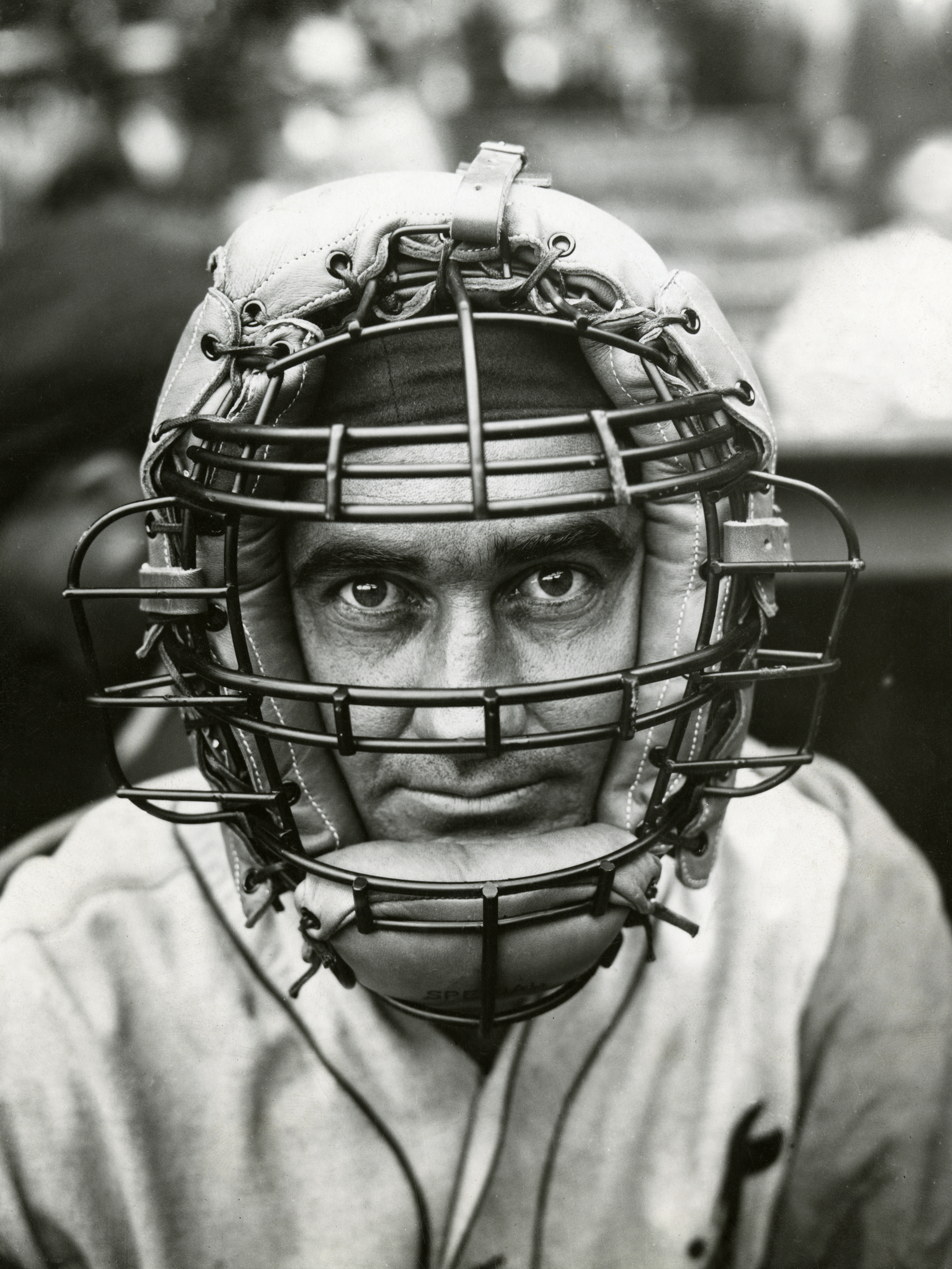Just months prior to being named American League Most Valuable Player, Detroit Tigers catcher Mickey Cochrane gazes out from behind his mask at Philadelphia's Shibe Park, Aug. 29, 1934.