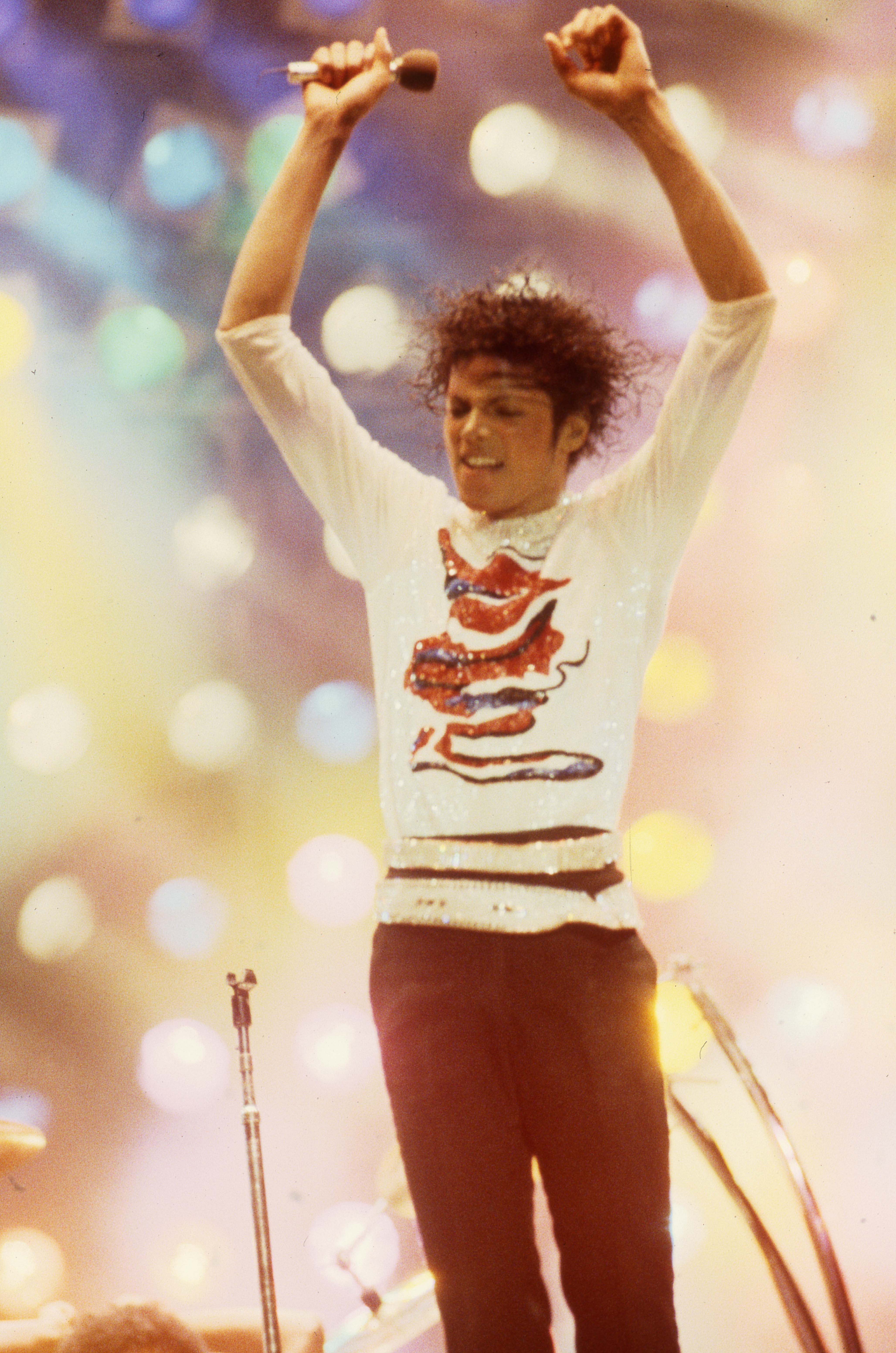 Michael Jackson receives an award during his Victory Tour circa 1984.