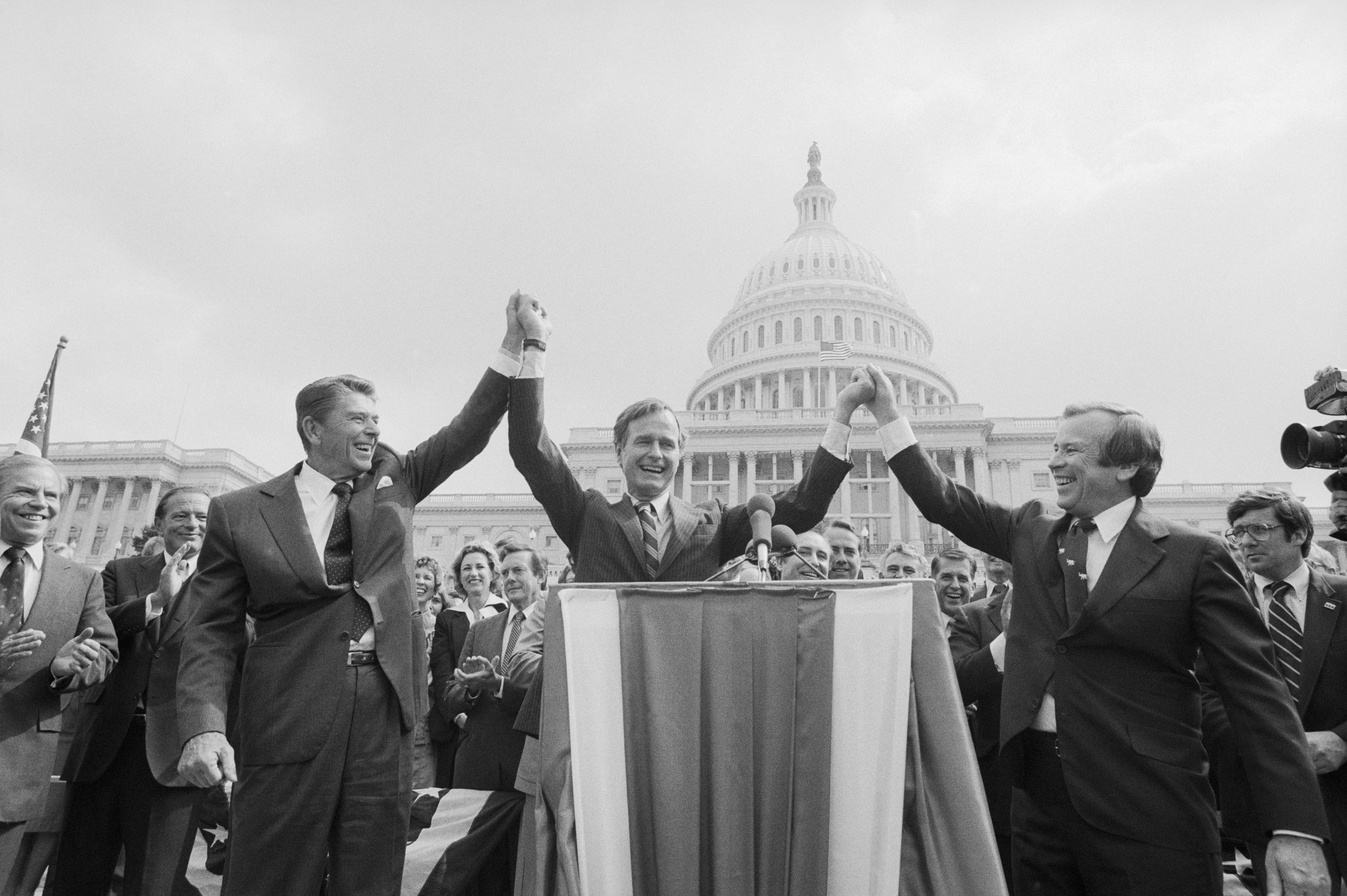 Reagan would prove to be the more popular conservative candidate in the race for the Presidency and would eventually gain the Republican nomination, but in a surprising turn of events, Reagan would pick Bush to be his vice presidential nominee. Here, the two candidates join Senate Majority leader Howard Baker for a rally on Capitol Hill in September 1980. (Ron Edmonds—Bettmann/Corbis)