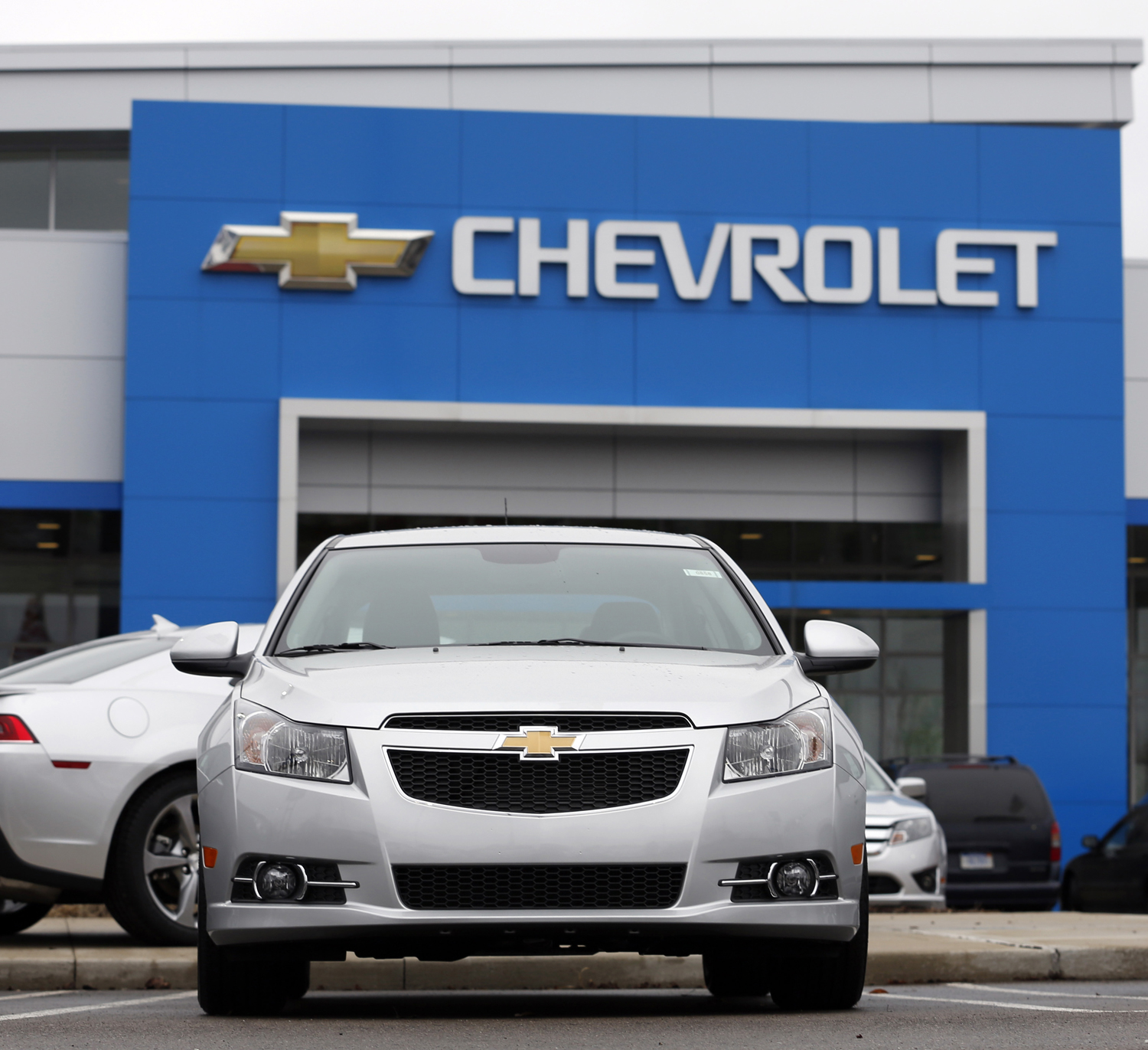 A General Motors Co. 2014 Chevrolet Cruze vehicle sits on the lot at a dealership in Southfield, Michigan, March 28, 2014.
