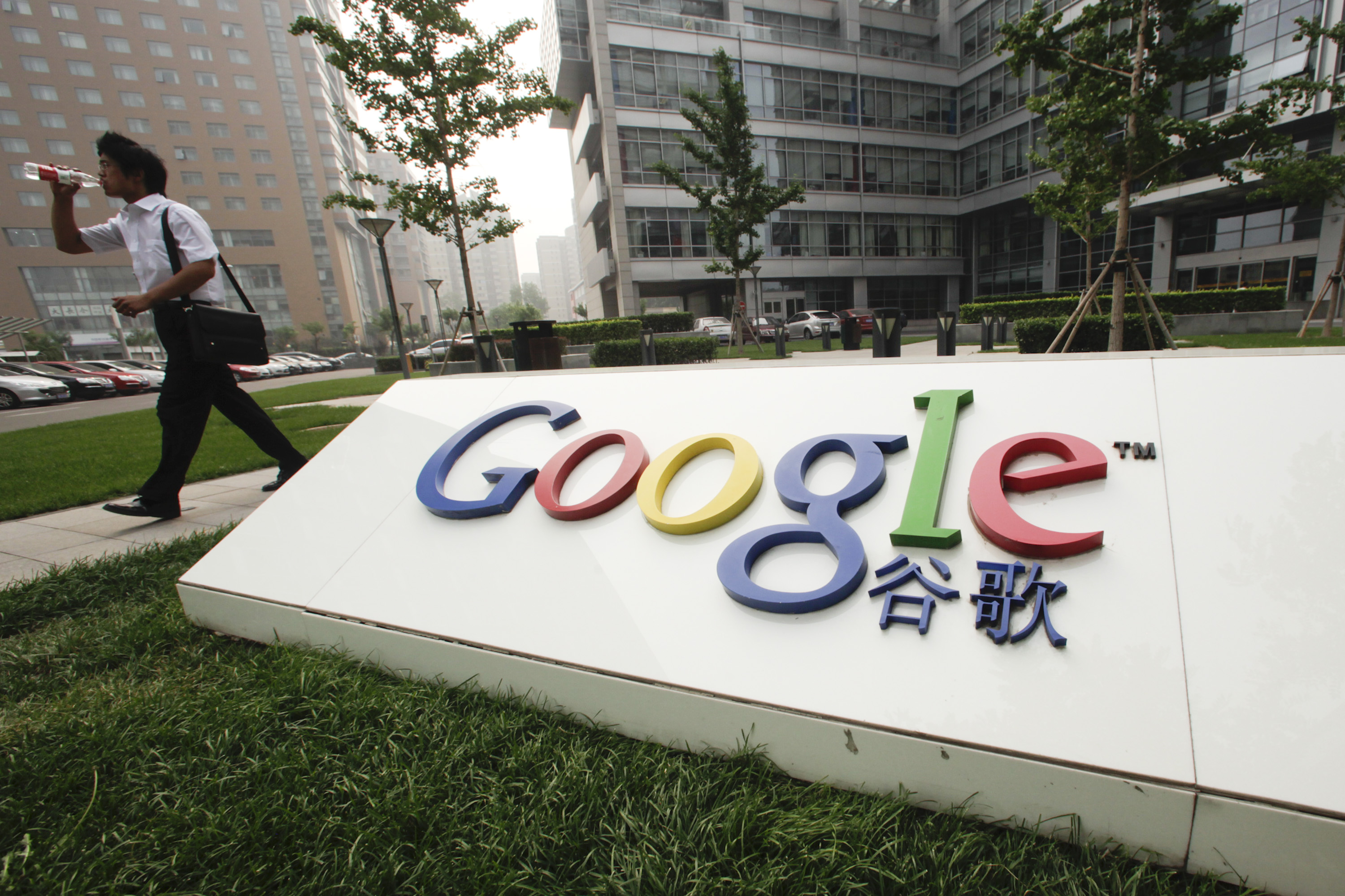 A pedestrian walks past Google Inc.'s China headquarters in Beijing, China, on Tuesday, June 29, 2010. (Bloomberg&mdash;Bloomberg via Getty Images)