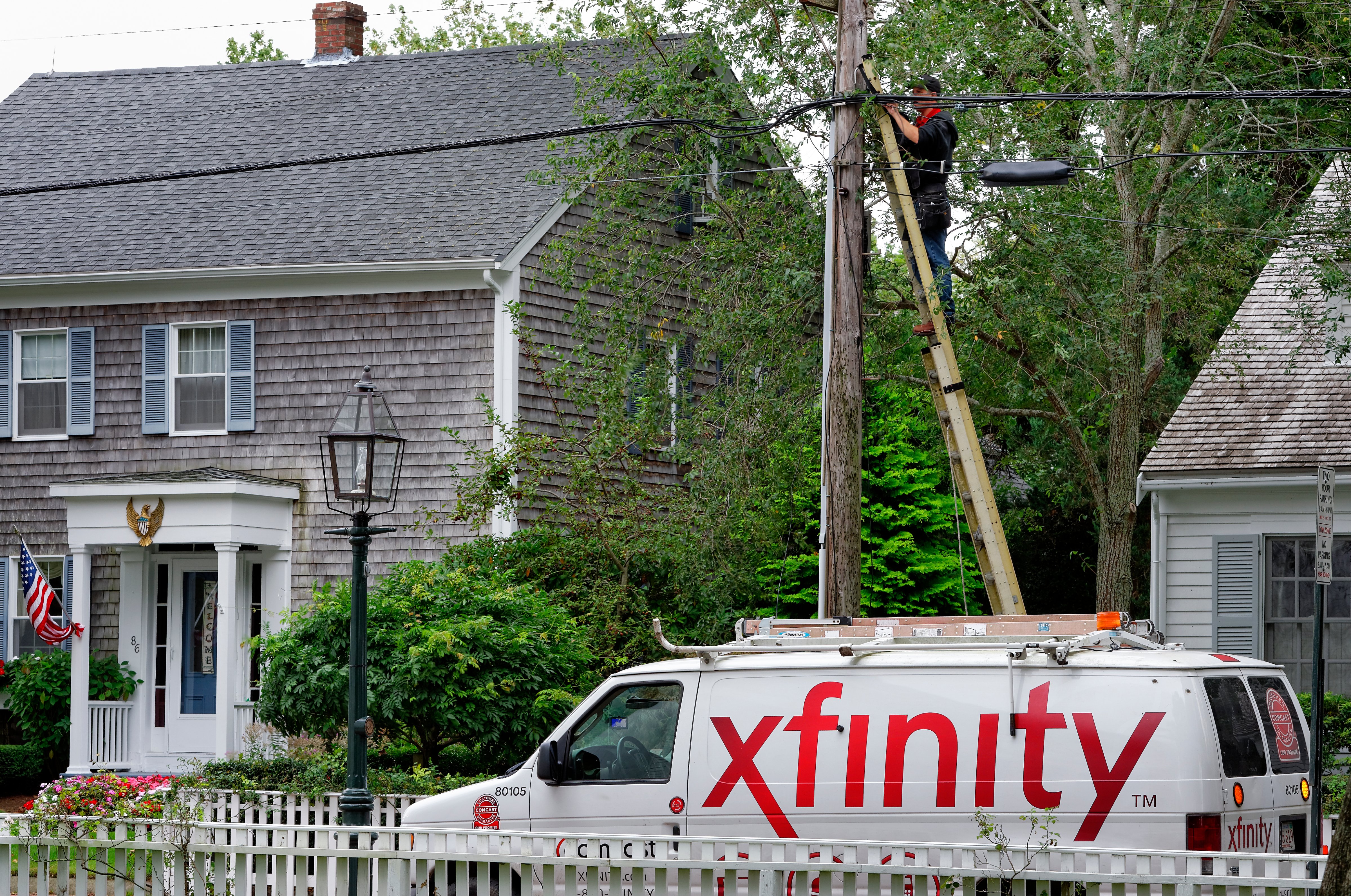 A Comcast worker installs Xfinity into a home. (John Greim&mdash;© 2012 John Greim)